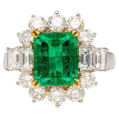 2.55 Colombian Emerald With Round & Emerald Cut Diamonds Sides Ring in 18K Gold