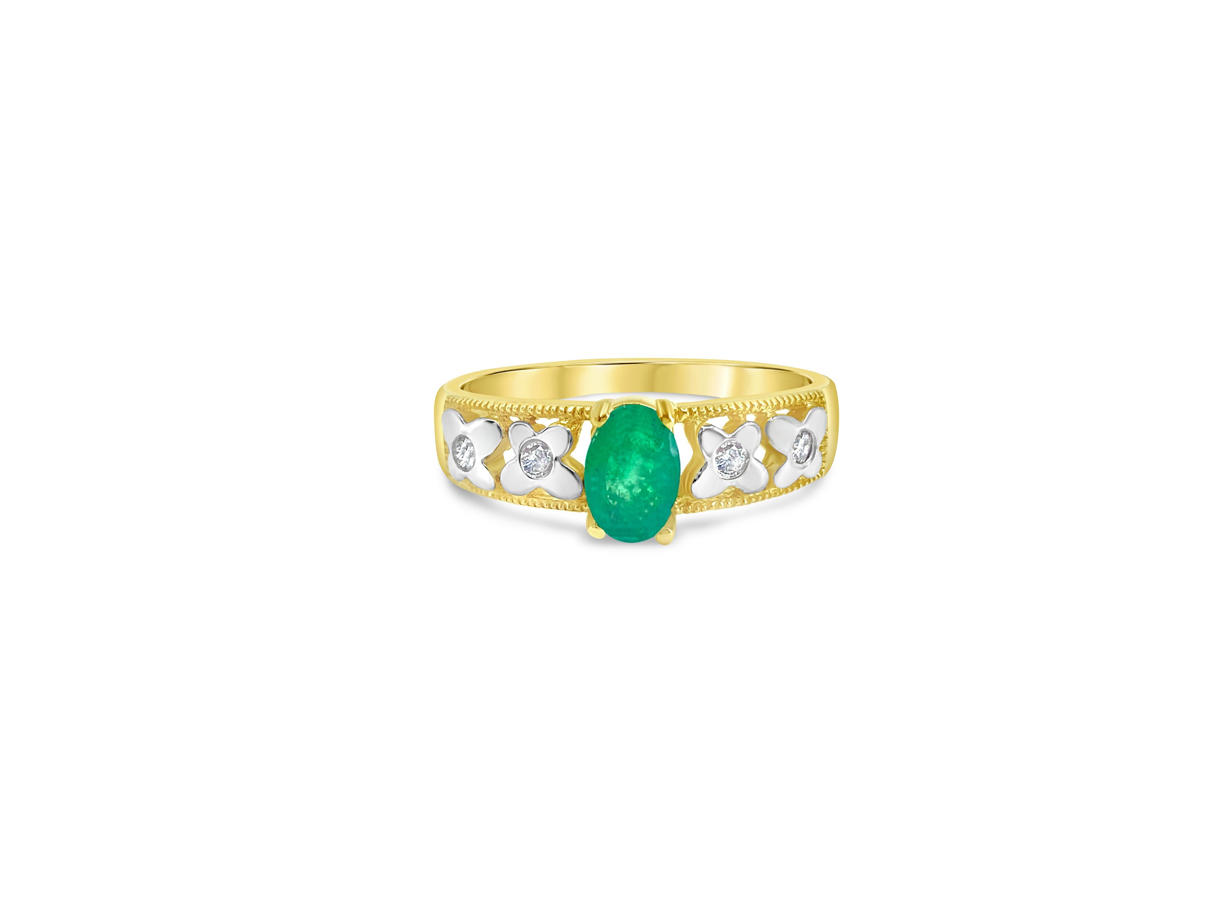Introducing this captivating cocktail ring crafted from 10k yellow and white gold, featuring a stunning 2.55 carat natural earth-mined emerald as the centerpiece, showcasing excellent hue and saturation. Adorned with a total of 0.15 carats of side