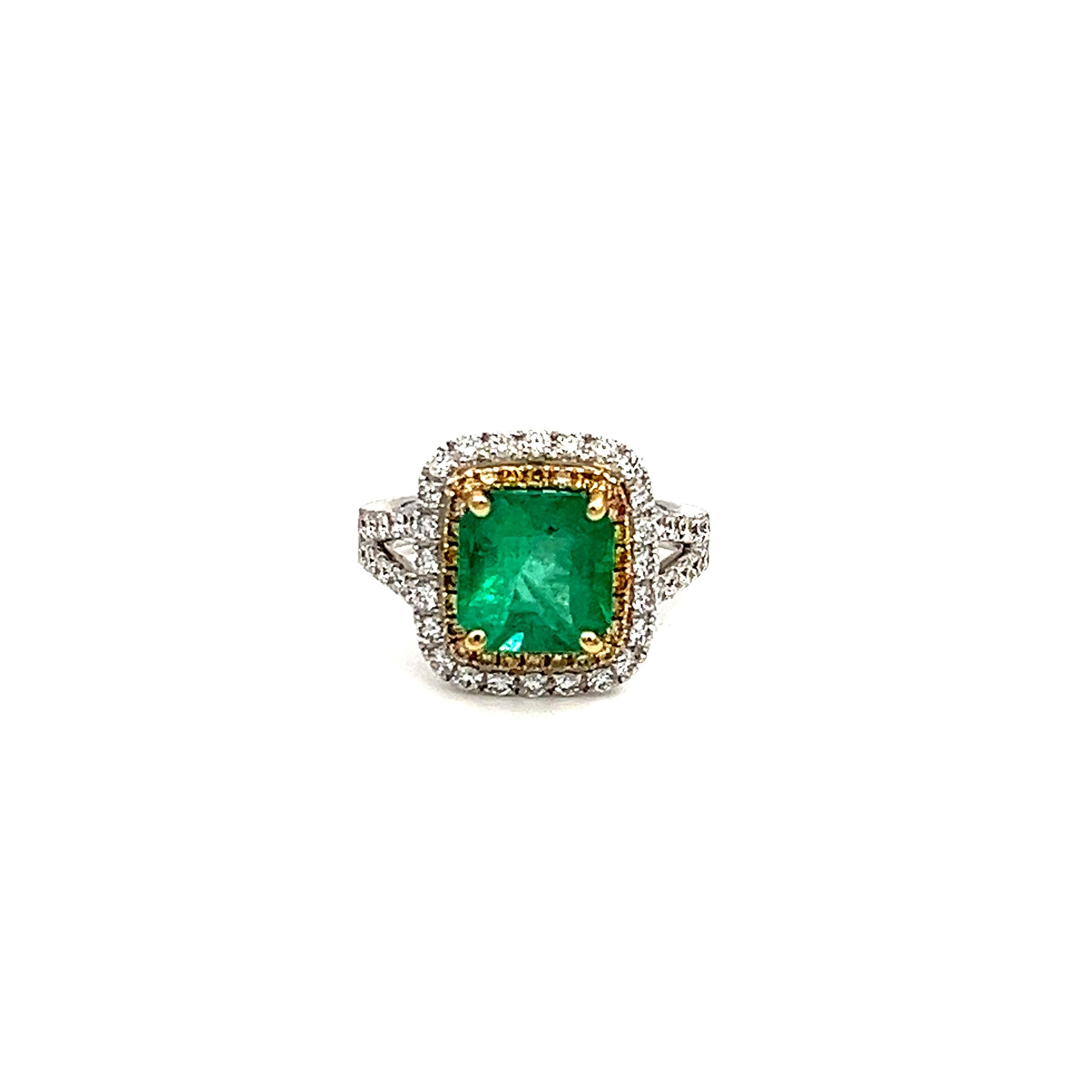 Check out this vibrant natural green emerald and diamond ring! The ring features one square shape emerald weighing 2.55 cts. The ring is also set with natural white and yellow diamonds weighing 1.01 ct total and graded VS. The ring is made in 18k