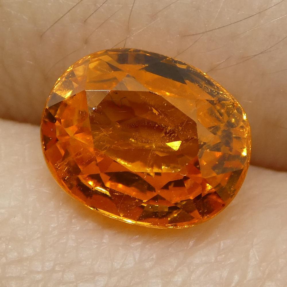 Description:

Gem Type: Spessartite Garnet
Number of Stones: 1
Weight: 2.55 cts
Measurements: 8.28x6.71x4.44 mm
Shape: Oval
Cutting Style Crown: Modified Brilliant Cut
Cutting Style Pavilion: Step Cut
Transparency: Transparent
Clarity: Slightly