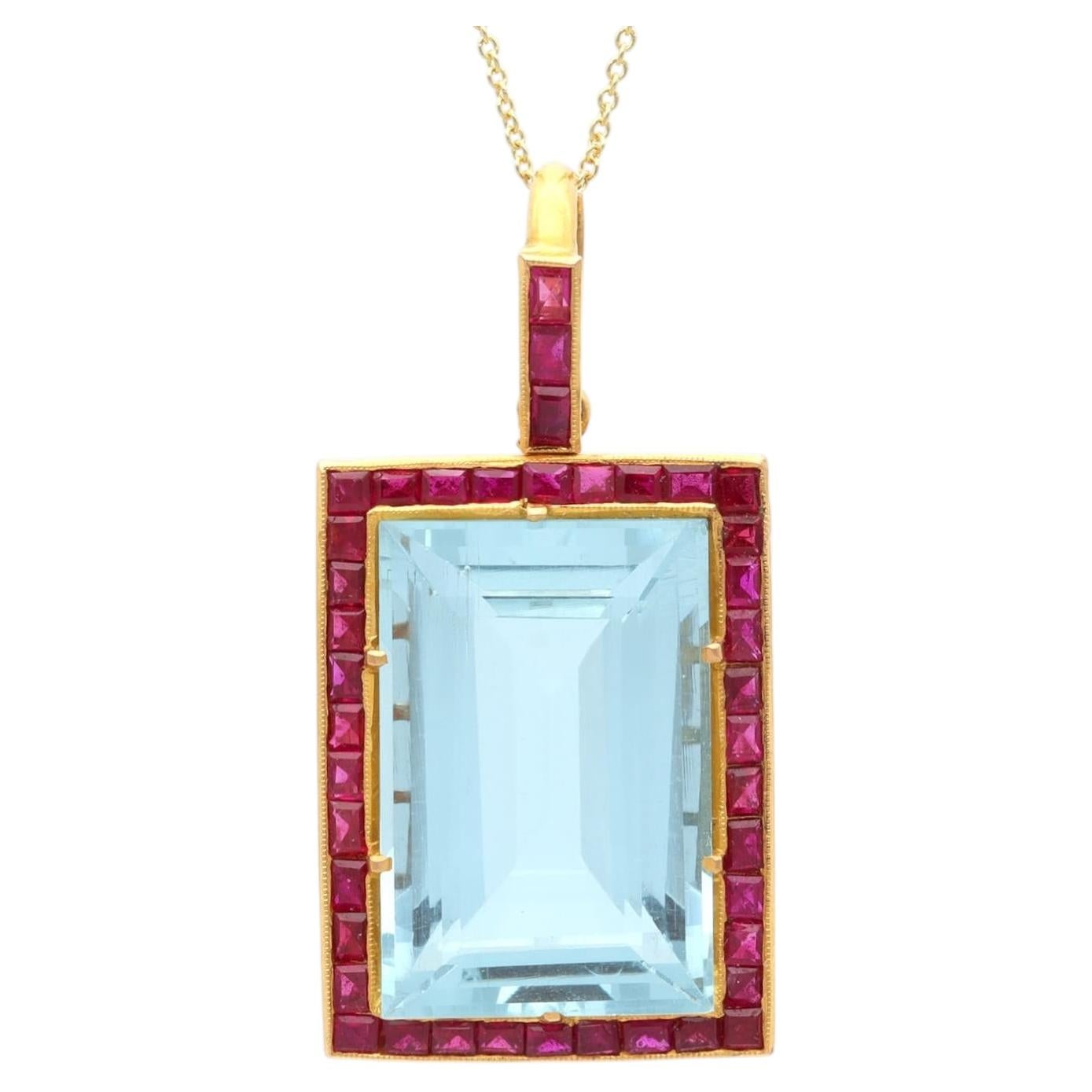 25.55 Carat Aquamarine 2.65 Carat Ruby 22k Yellow Gold Pendant Circa 1950