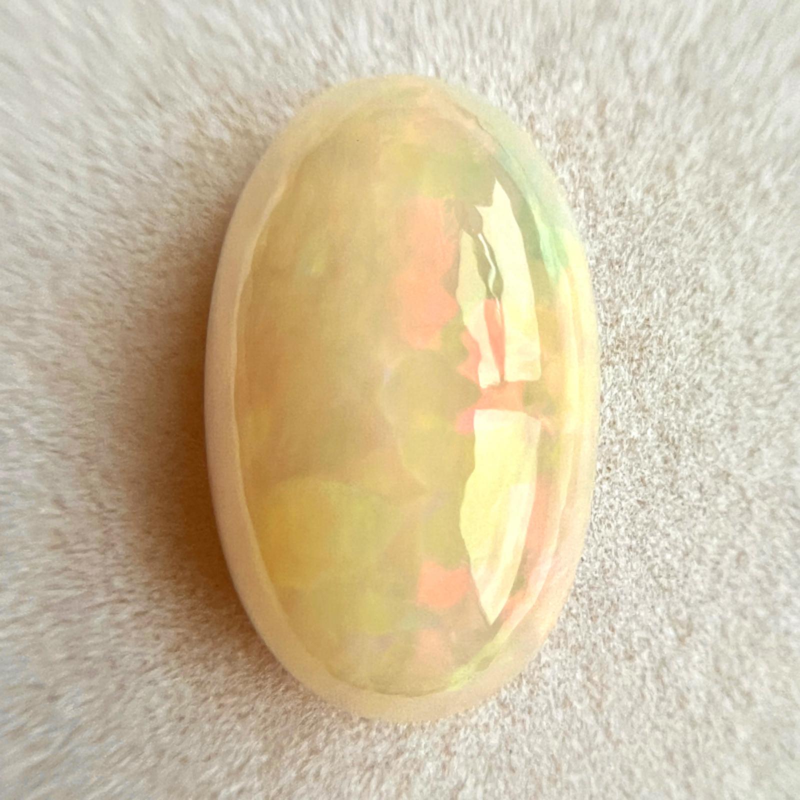 25,57ct Natürlicher weißer Kristall Opal Oval Cabochon Edelstein 26,8x17mm Lose Edelstein

Natürlicher loser weißer Opal Edelstein.
Atemberaubender Opal von 25,57 Karat mit schönem Farbenspiel. Rot, Grün, Lila, Blau, Gelb und Orange.
Weißer Opal mit
