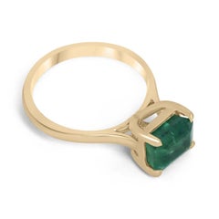 2.55ct 18K East to West Emerald Cut Emerald Solitaire 4 Prong Gold Accent Ring