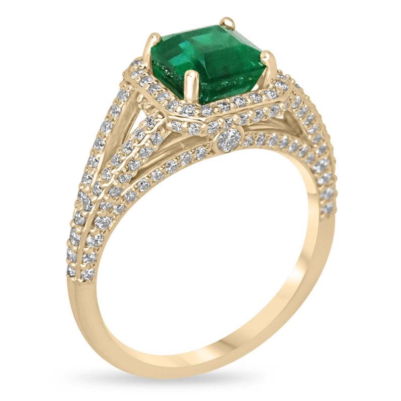 Celebrate your love with our breathtaking emerald and diamond engagement ring, featuring a AAA fine quality Asscher cut emerald weighing 2.10 carats. The rich green color and semi-transparent clarity of the emerald are beautifully showcased,