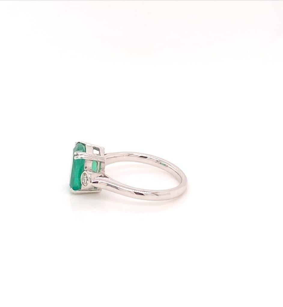 2.56 Carat Cushion Cut Emerald and Diamond Three-Stone Ring in 18k White Gold In New Condition In London, GB