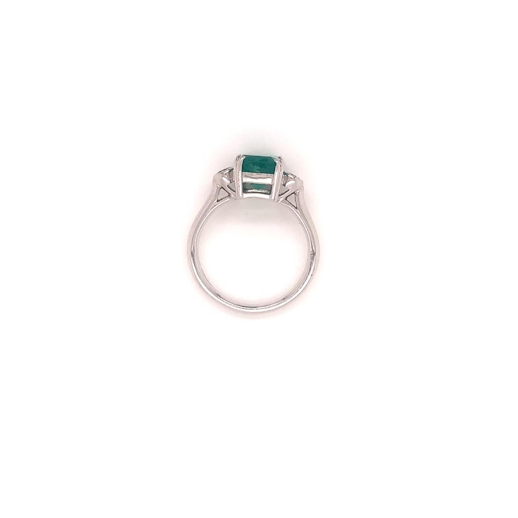 Women's 2.56 Carat Cushion Cut Emerald and Diamond Three-Stone Ring in 18k White Gold