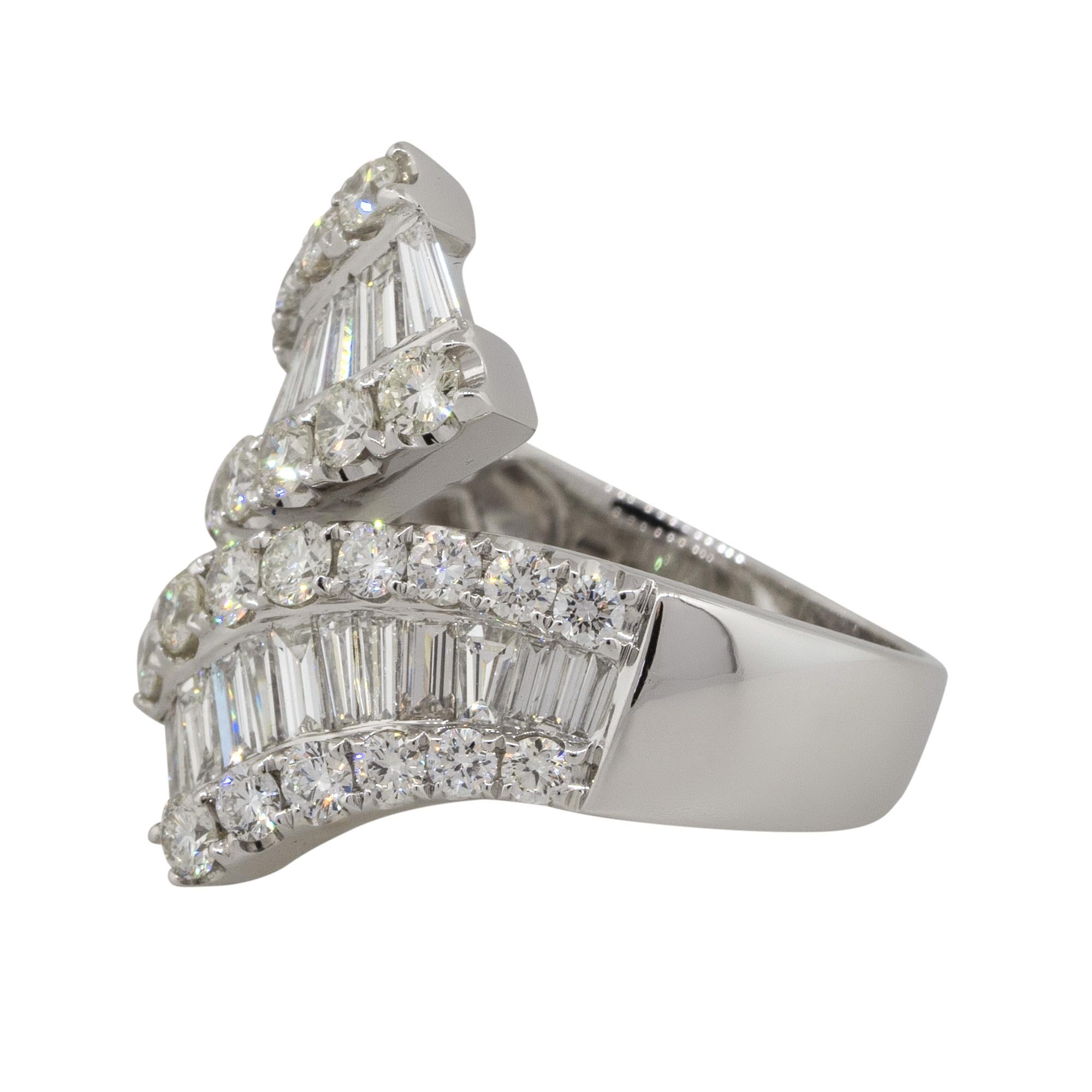 Material: 18k white gold
Diamond Details: Approx. 1.37ctw of round cut Diamonds. Diamonds are G/H in color and VS in clarity
                             Approx. 1.19ctw of baguette cut Diamonds. Diamonds are G/H in color and VS in clarity
Size: