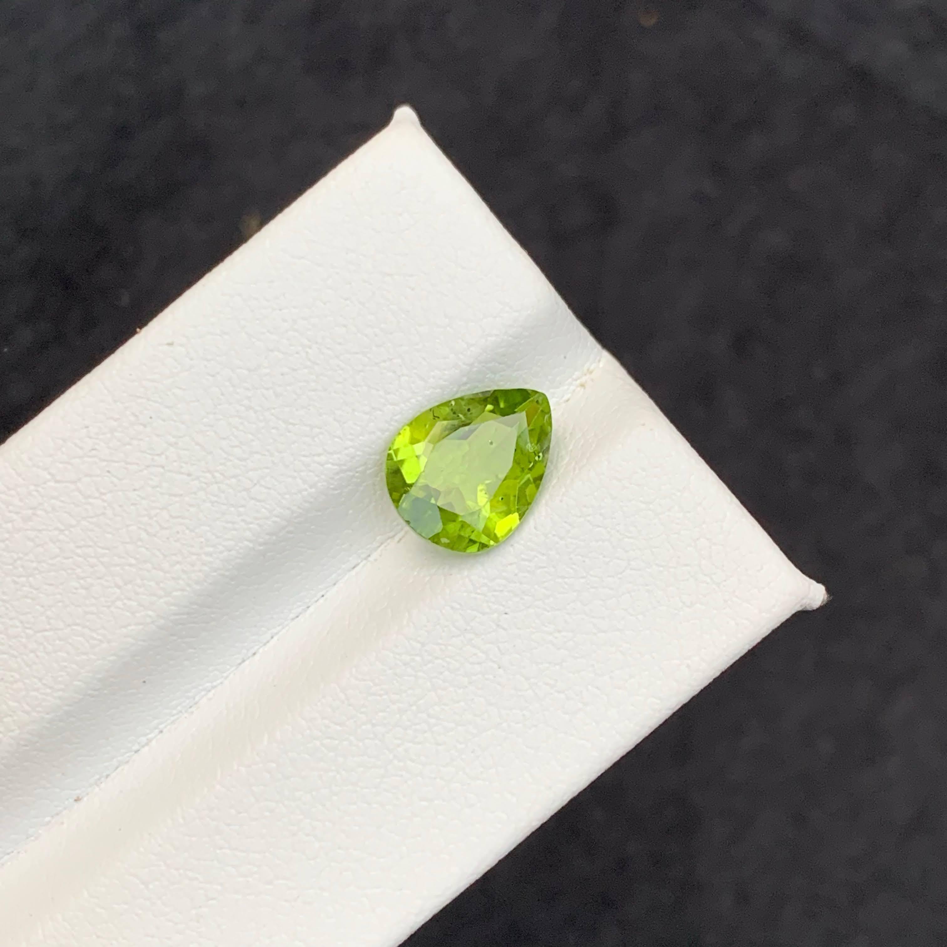 Women's or Men's 2.56 Carat Natural Loose Apple Green Peridot Stone Pear Cut Pakistani Gemstone For Sale
