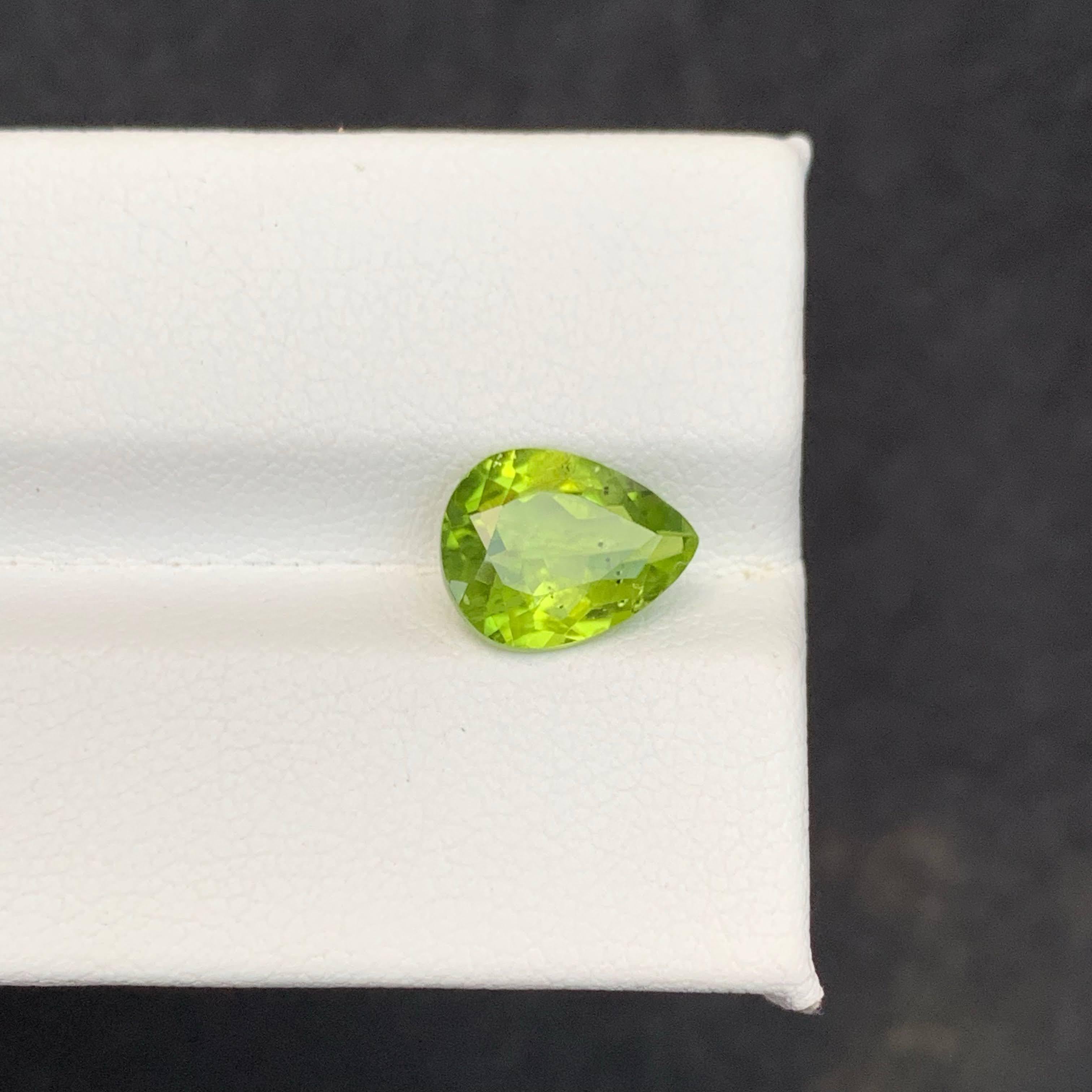 2.56 Carat Natural Loose Apple Green Peridot Stone Pear Cut Pakistani Gemstone For Sale 1