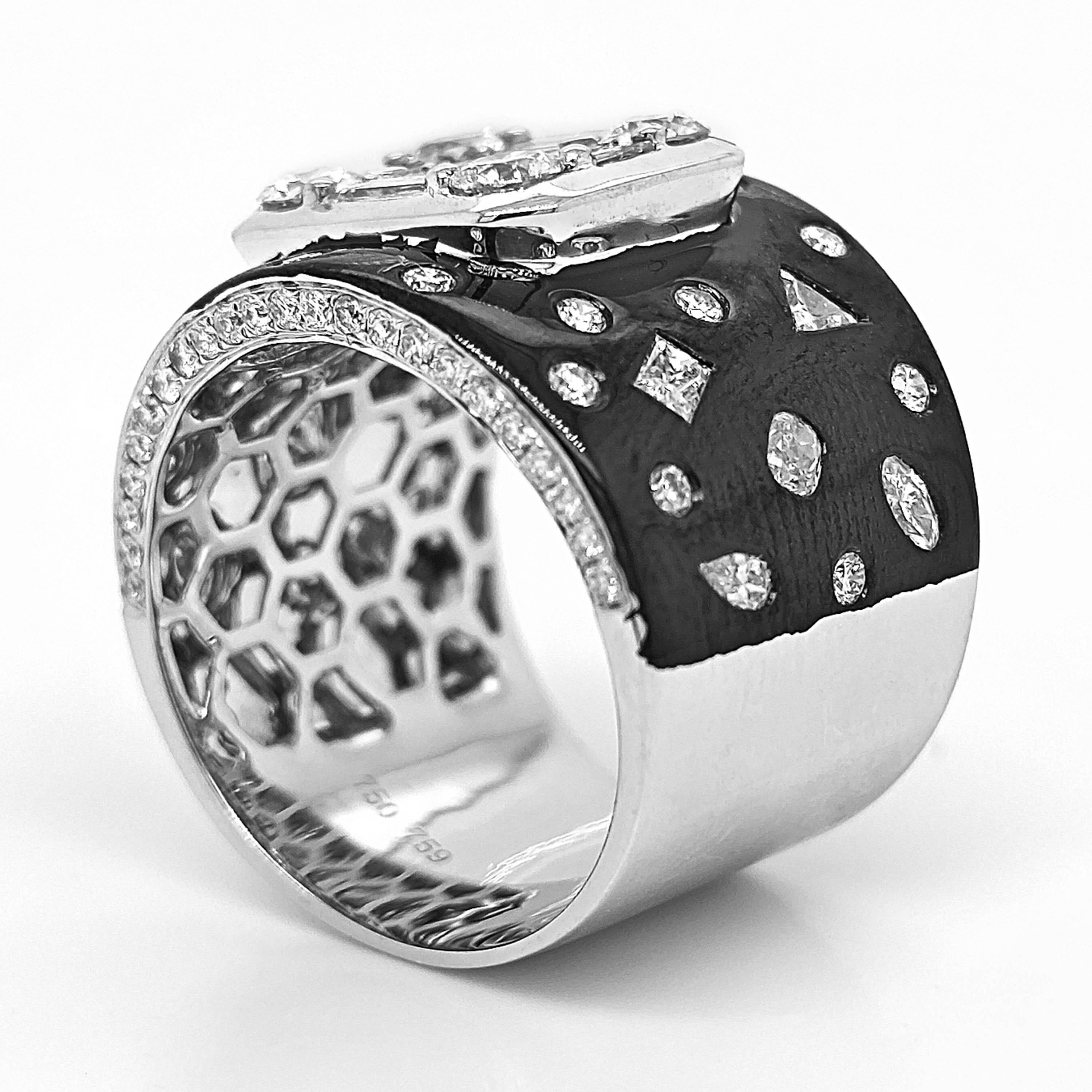 66 White Round Diamonds: 1.18 Carats
8 Baguette Diamonds: 0.86 Carats
10 Fancy Diamonds: 0.52 Carats
Metal: 18K White Gold, 14.17 Grams
