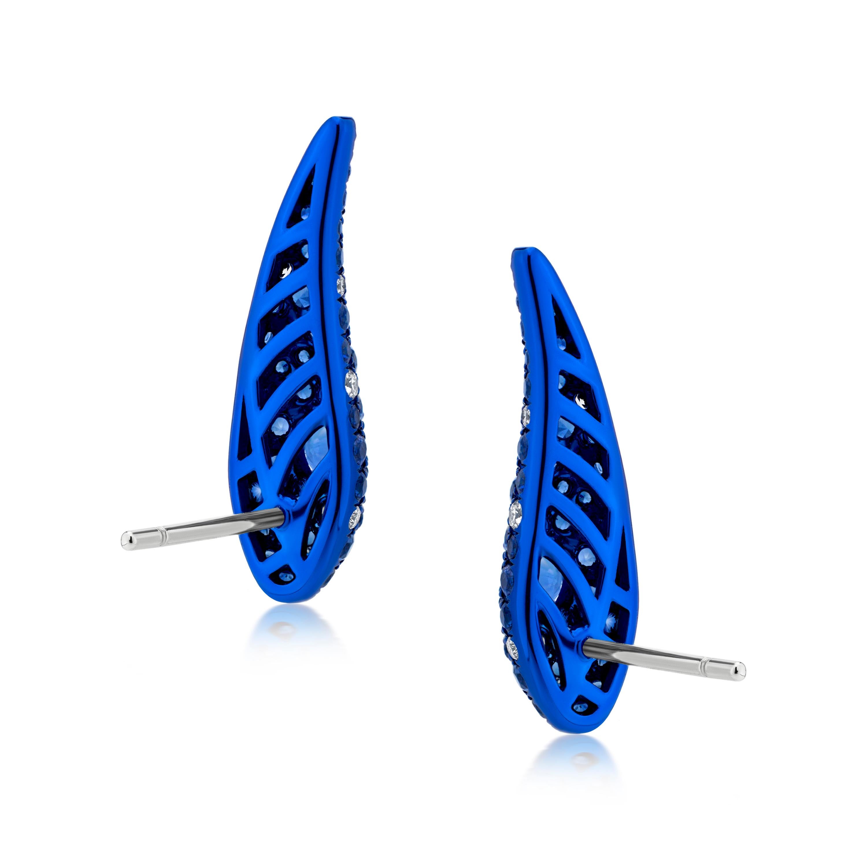 Make a dramatic statement with these stunning sapphire and diamond crawler earrings. Crafted from approximately 4.62 grams of high-quality metal, these earrings feature a unique, elongated design that gracefully crawls up the earlobe.

Each earring