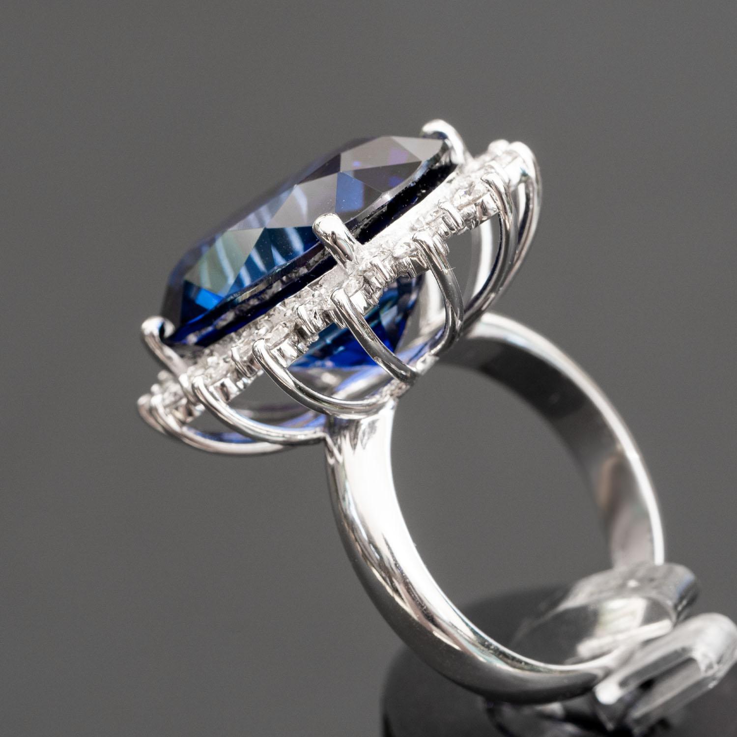 25.60 carat oval sapphire ring 1.30 carat natural diamonds statement ring In New Condition For Sale In Ramat Gan, IL