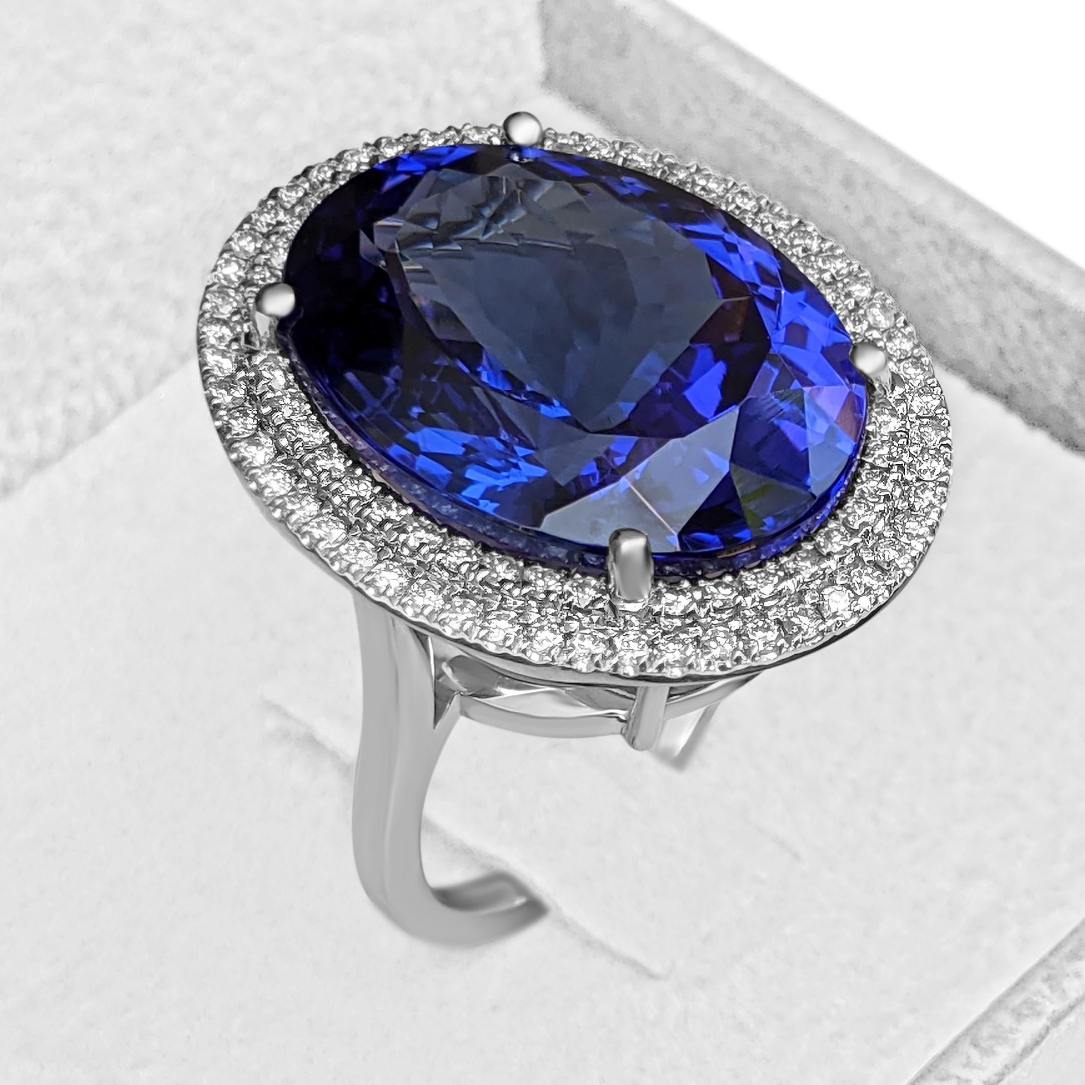 Oval Cut 25.65 Ct Violetish Blue Tanzanite & 0.90 Ct Diamonds, 18 Kt. White Gold, Ring