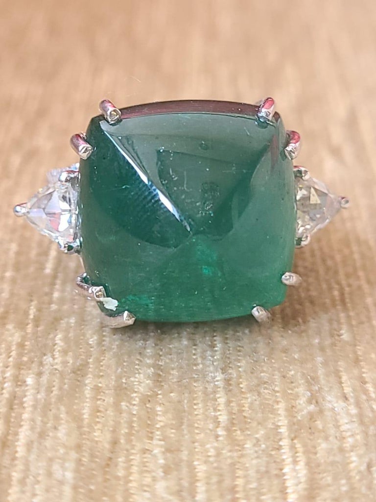 Art Deco 25.66 Carats, Sugarloaf Emerald & Trillion Diamonds Cocktail/ Engagement Ring For Sale