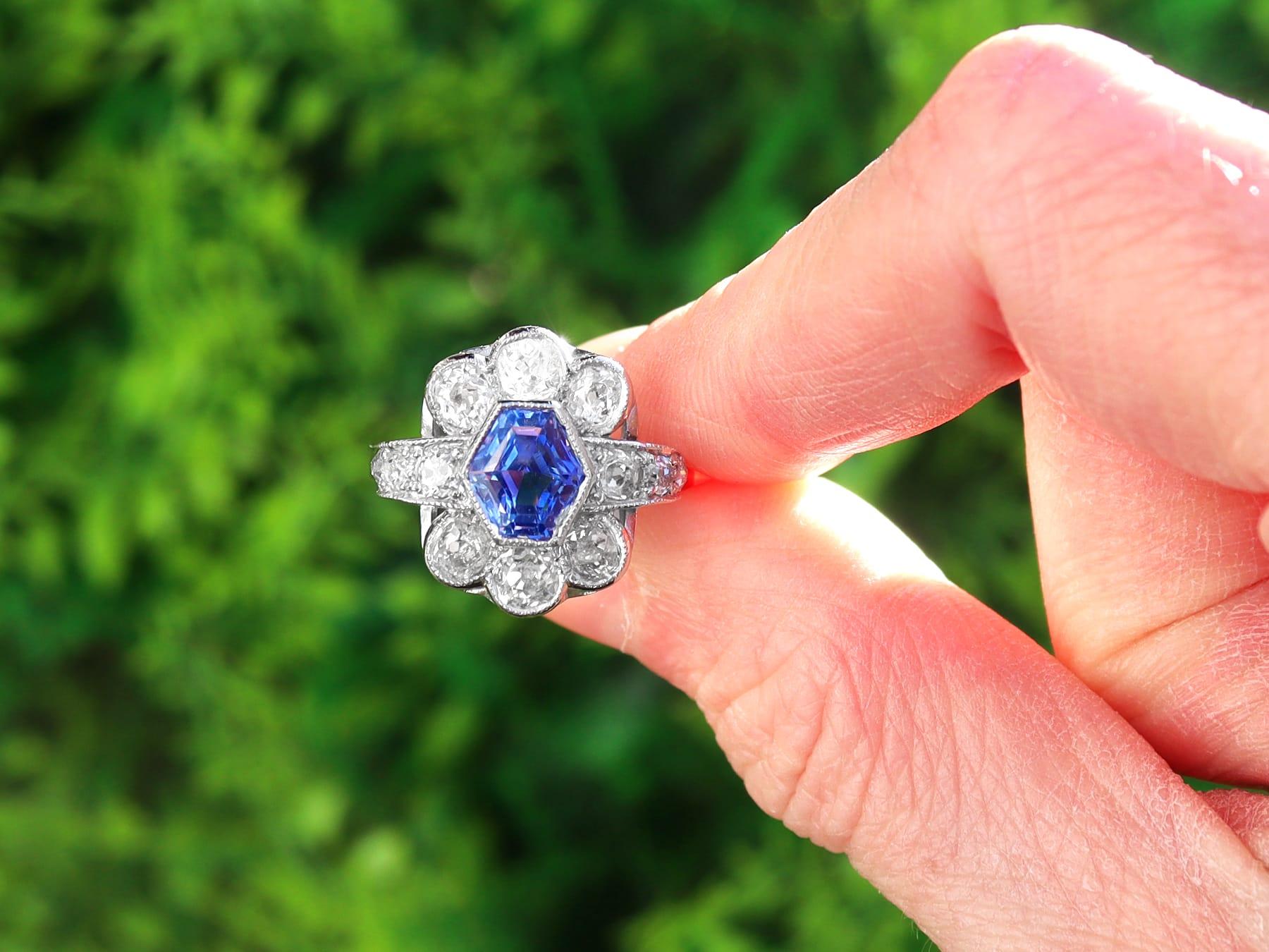 A stunning antique 1930's 2.56 carat Ceylon sapphire and 2.66 carat diamond, platinum cluster style dress ring; part of our diverse antique jewelry and estate jewelry collections.

This stunning, fine and impressive antique sapphire and diamond ring