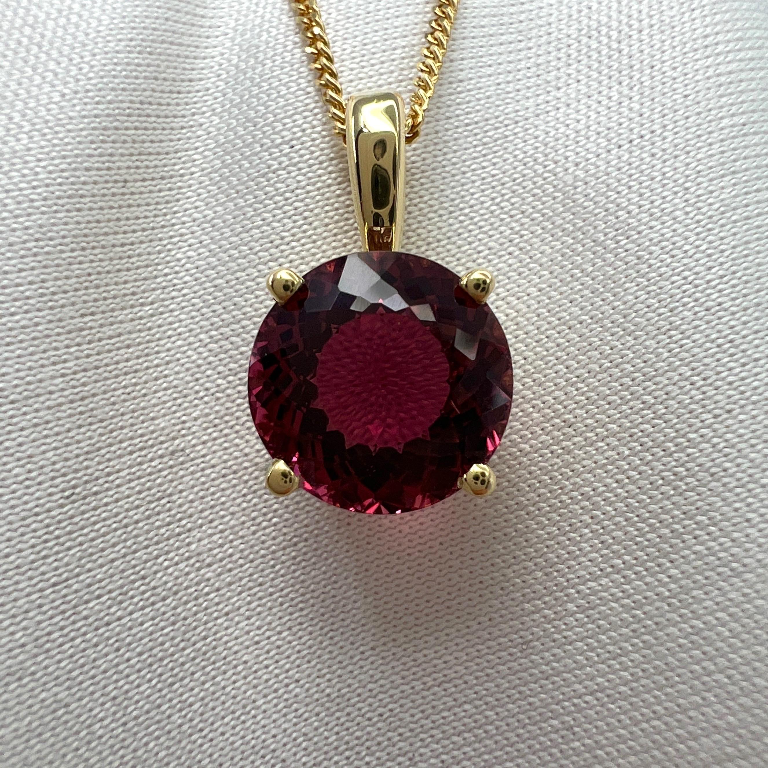 Fancy Round Cut Pink Orange Rubellite Tourmaline 18k Yellow Gold Pendant Necklace. 

2.56 Carat rubellite tourmaline with a beautiful deep pink orange colour, excellent clarity and an excellent fancy round cut.
Set in a fine 18k yellow gold