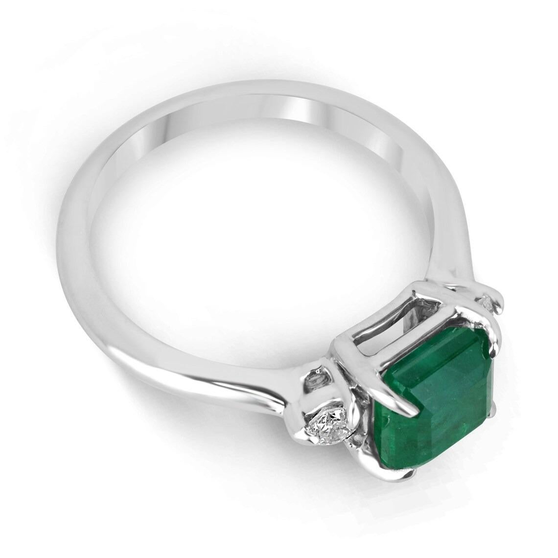 A classic emerald and diamond engagement, statement, or right-hand ring. Dexterously crafted in gleaming 14K white gold this ring features a 2.36-carat natural Zambian emerald-Asscher cut. Set in a secure prong setting, this extraordinary emerald