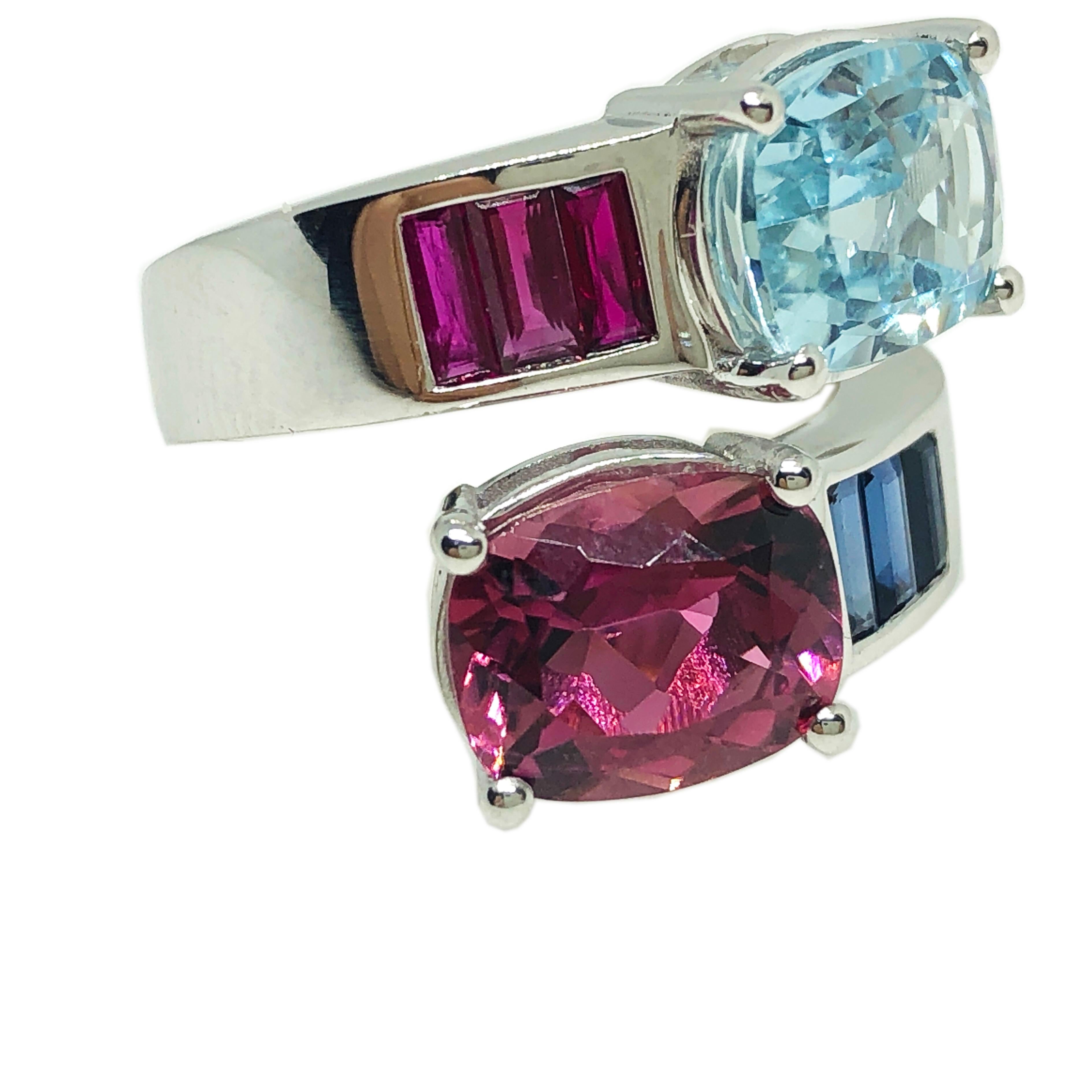 One-of-a-kind Toi et Moi Contemporary Cocktail Ring featuring 2.57 Carat  Aquamarine  and 2.80 Carat Pink Tourmaline  Antik Cushion Cut in a sumptuous 0.59 Natural Sapphire Baguette and 0.58 natural Ruby Baguette White Gold Setting. In our fitted