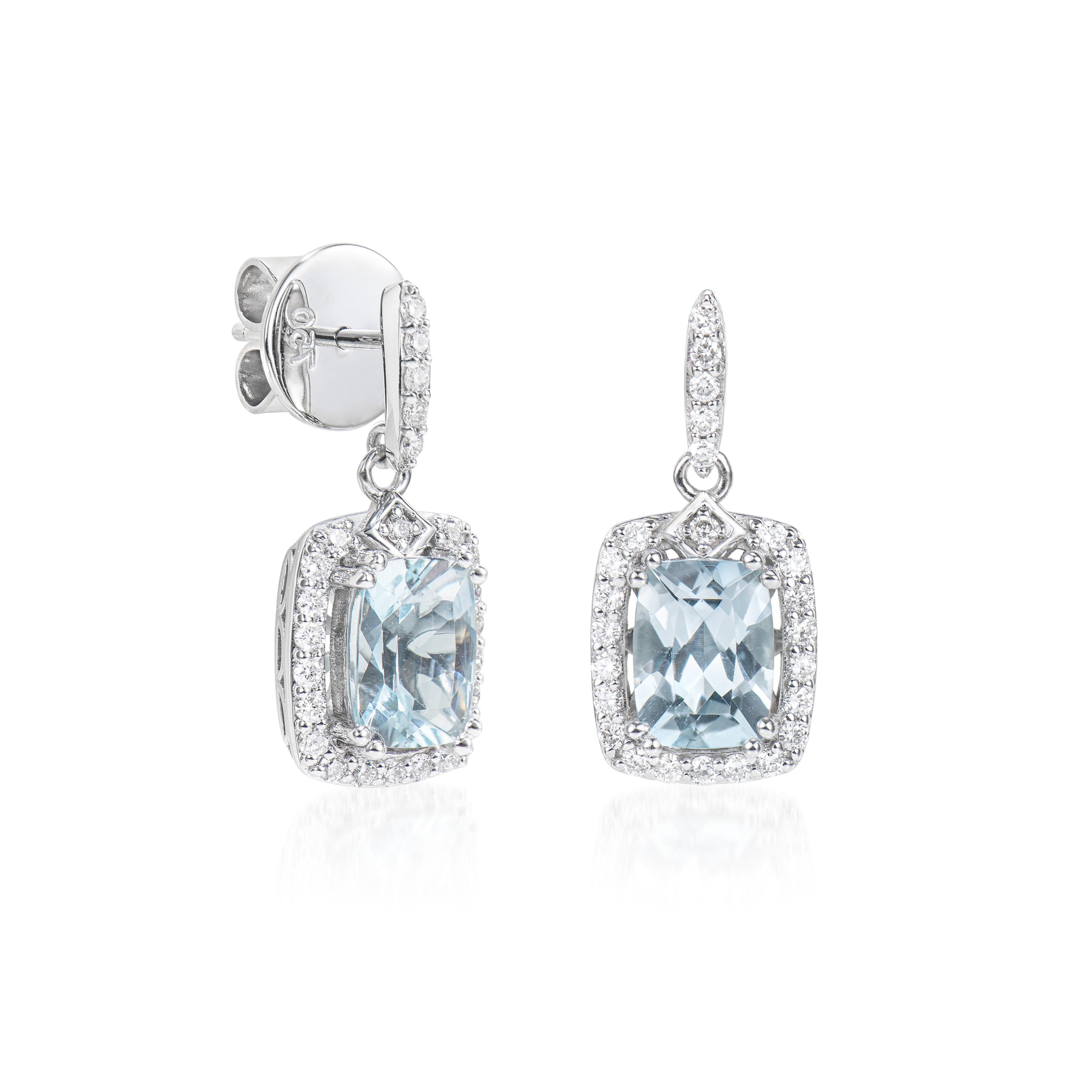 This collection features an array of aquamarines with an icy blue hue that is as cool as it gets! Accented with White Diamonds these Drop Earrings are made in white gold and present a classic yet elegant look. 

Aquamarine Drop Earrings in 18Karat
