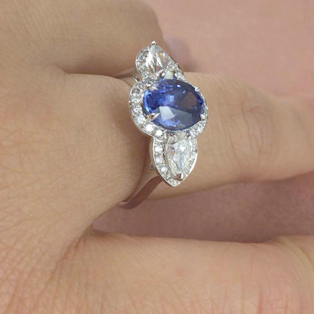 2.57 Carat Ceylon Blue Oval Sapphire Diamond Cluster Ring Natalie Barney For Sale 1
