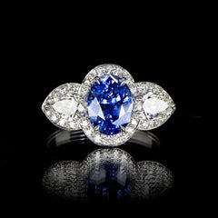 2.57 Carat Ceylon Blue Oval Sapphire Diamond Cluster Ring Natalie Barney