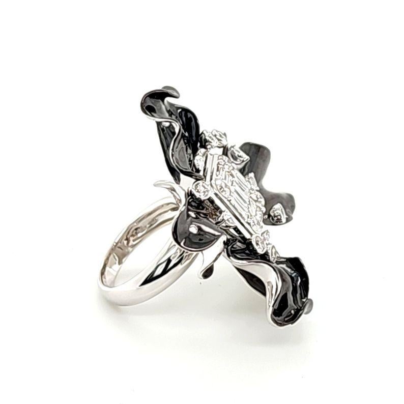 38 White Round Diamonds: 1.39 Carats
9 White Baguette Diamonds: 1.00 Carats
5 White Marquise Diamonds: 0.18 Carats
Metal: 18K White Gold, 28.22 Grams
