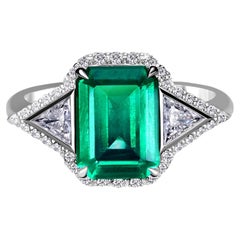 AGL Certified 2.57 Carat Emerald Three Stone Halo Ring