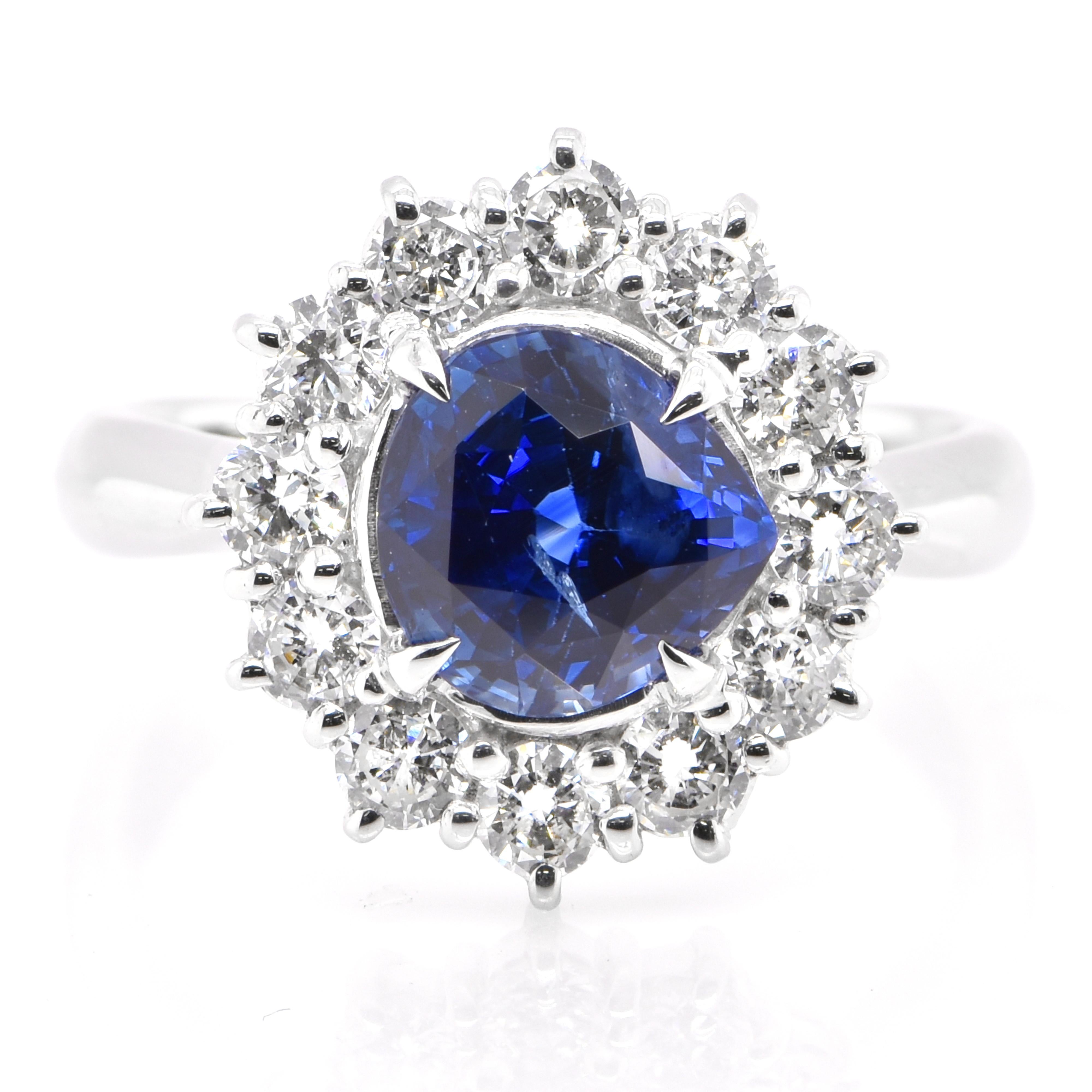 A beautiful ring featuring a 2.578 Carat, Natural Blue Sapphire and 0.898 Carats Diamond Accents set in Platinum. Sapphires have extraordinary durability - they excel in hardness as well as toughness and durability making them very popular in