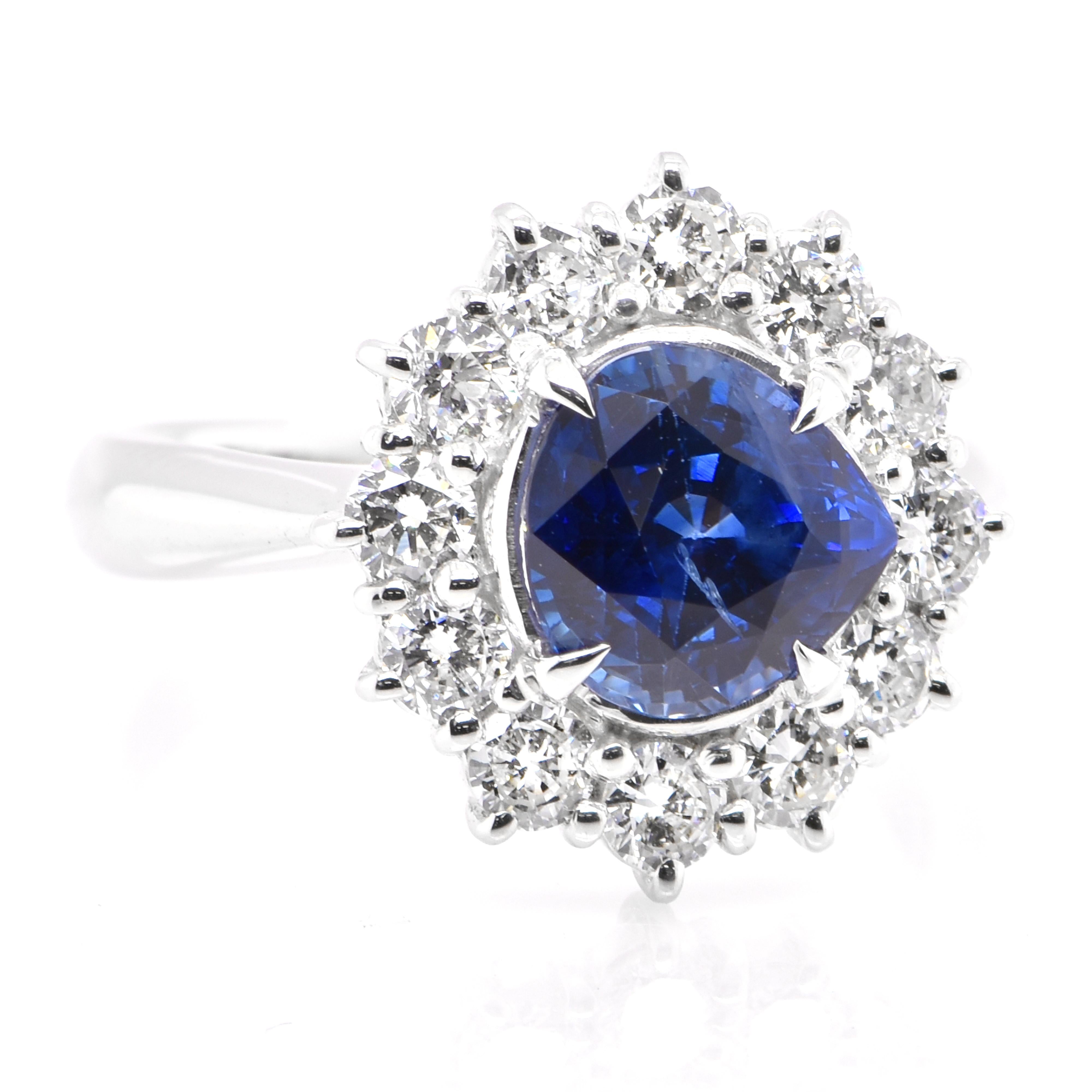 Modern 2.57 Carat Natural Royal Blue Sapphire and Diamond Ring Set in Platinum For Sale