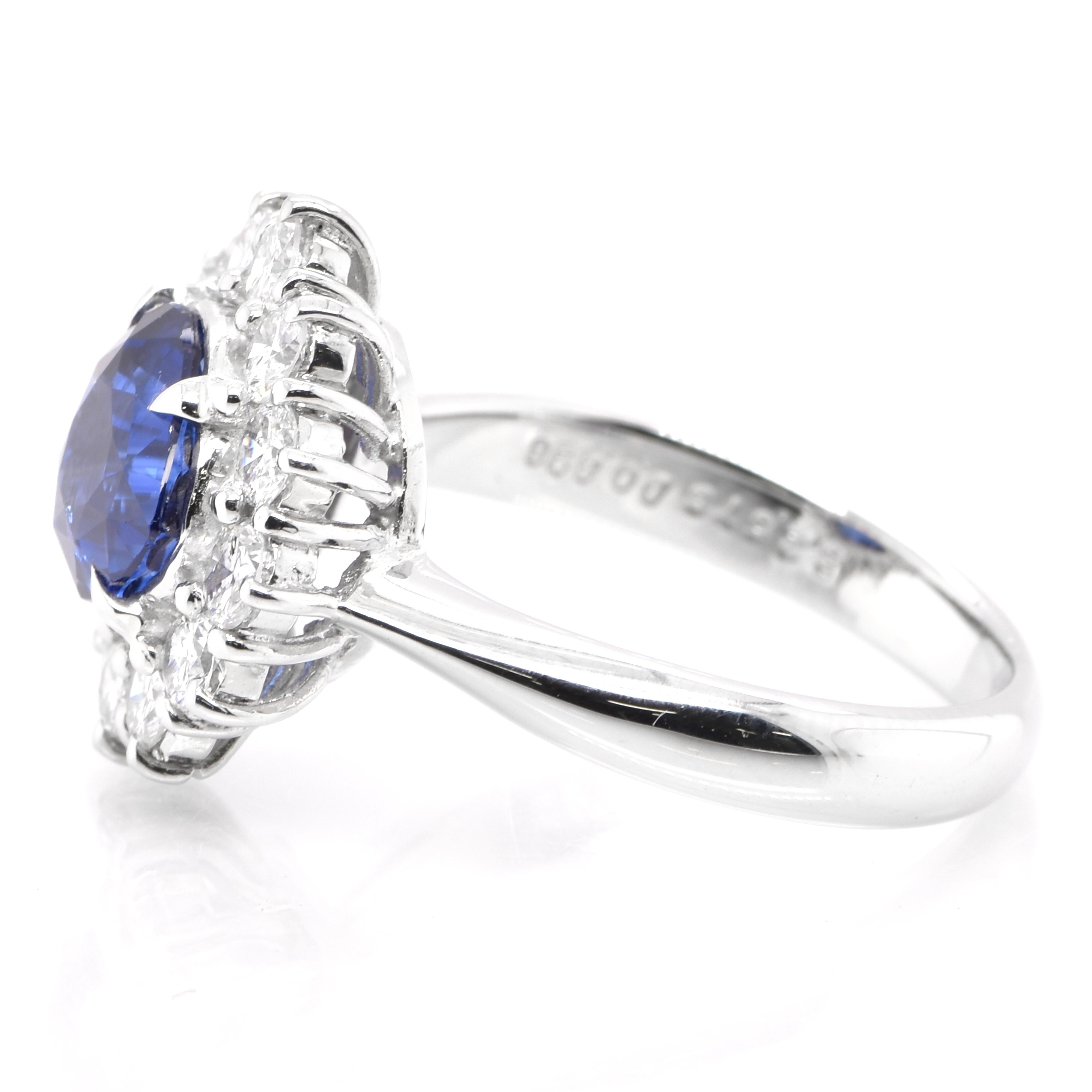Pear Cut 2.57 Carat Natural Royal Blue Sapphire and Diamond Ring Set in Platinum For Sale