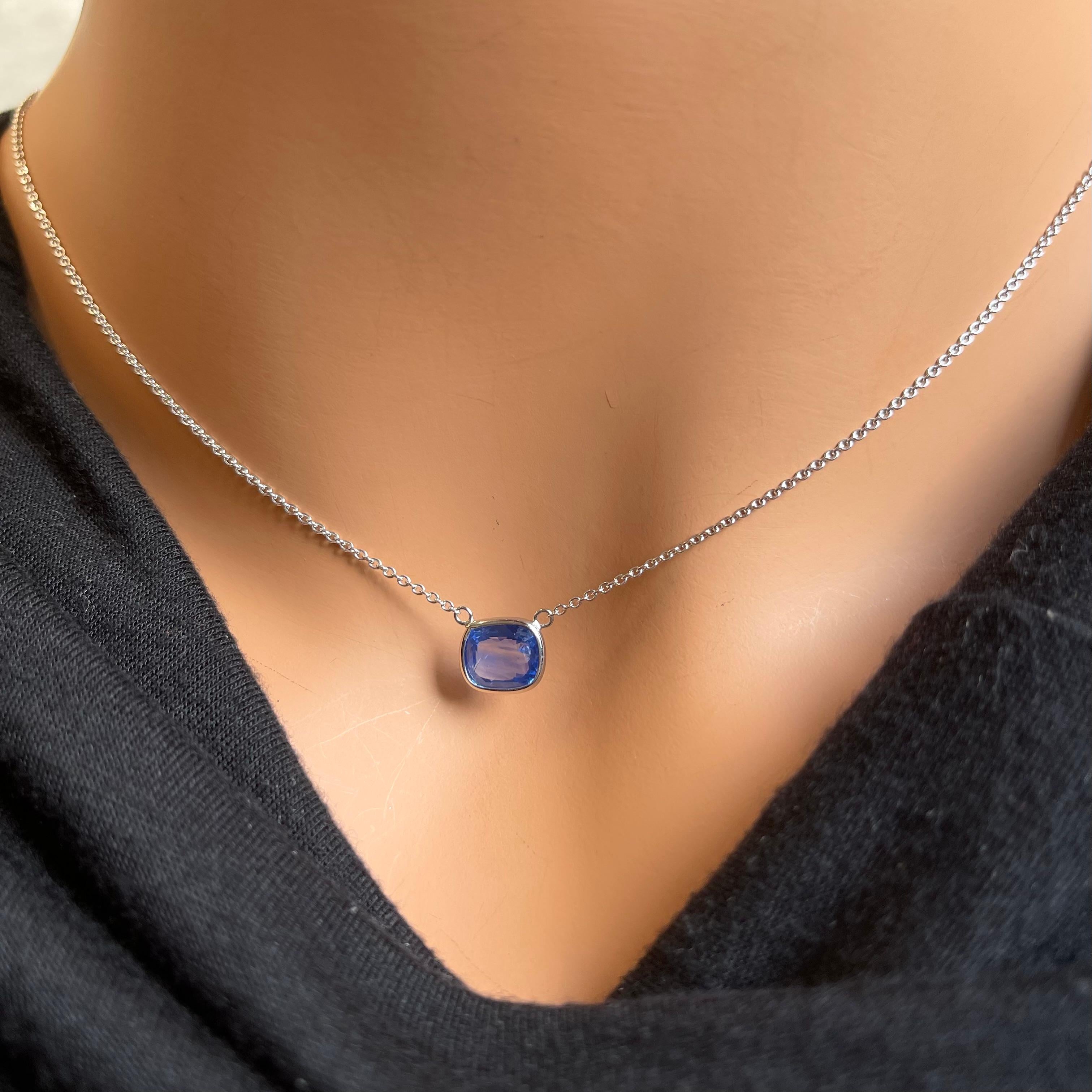 A fashion necklace made of 14k white gold with a main stone of a certified blue cushion-cut sapphire weighing 2.57 carats would be a stunning and sophisticated choice. Blue sapphires are renowned for their deep and mesmerizing color, and the cushion