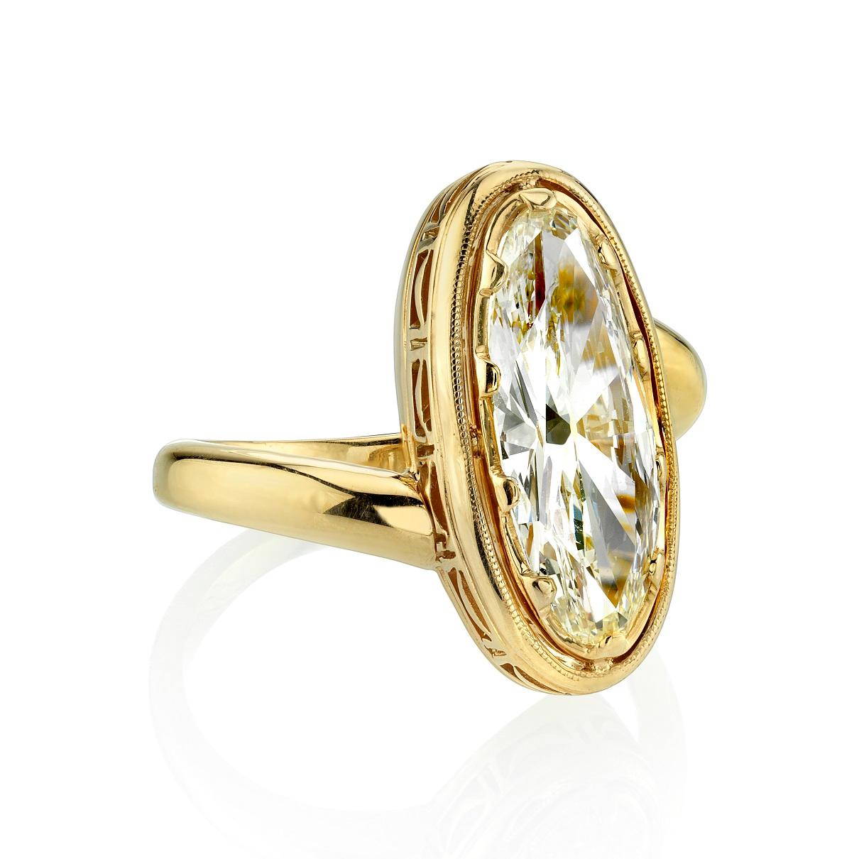 2.57ct L/VS1 EGL certified vintage Moval cut diamond set in a handcrafted 18k yellow gold mounting. This beautiful ring sits very low profile and offers a lot of finger coverage. This stunning vintage moval is very uniqeu. While the weight is