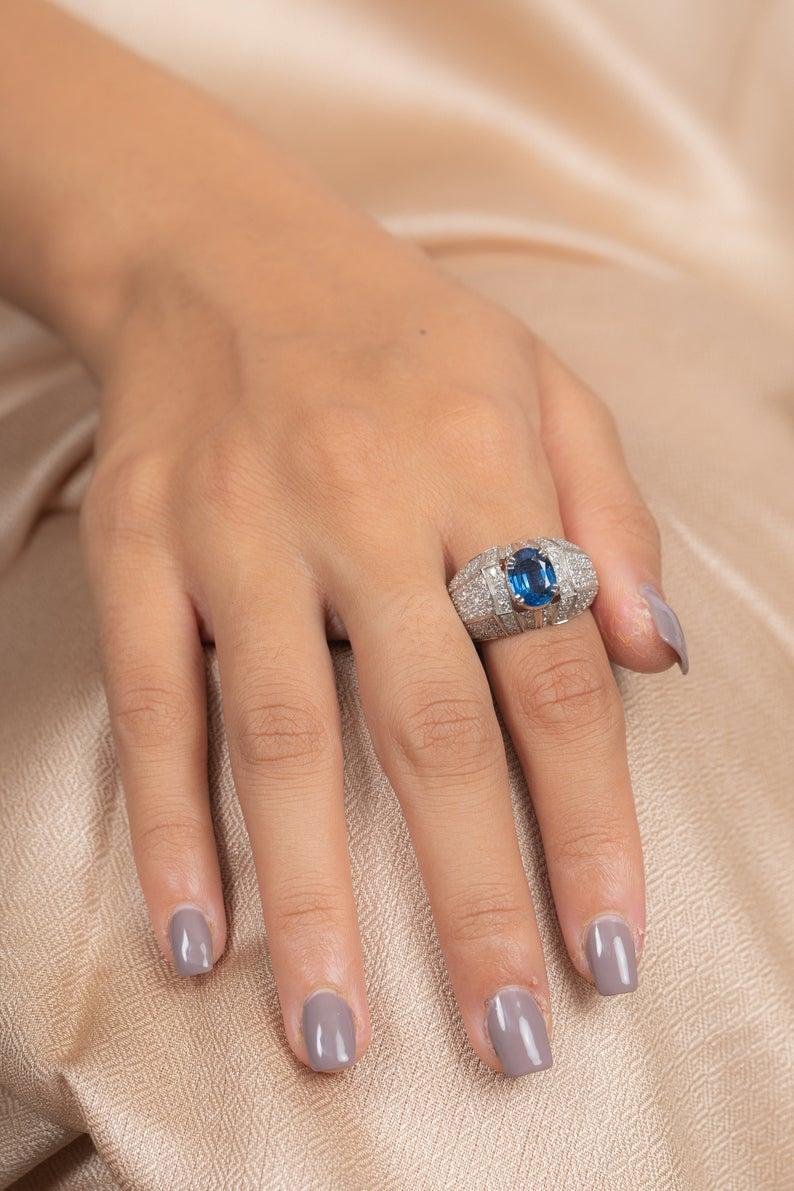 This ring has been meticulously crafted from 14-karat white gold.  It is hand set with 2.57 carats blue sapphire & 1.44 carats of sparkling diamonds. 

The ring is a size 7 and may be resized to larger or smaller upon request. 
FOLLOW  MEGHNA JEWELS