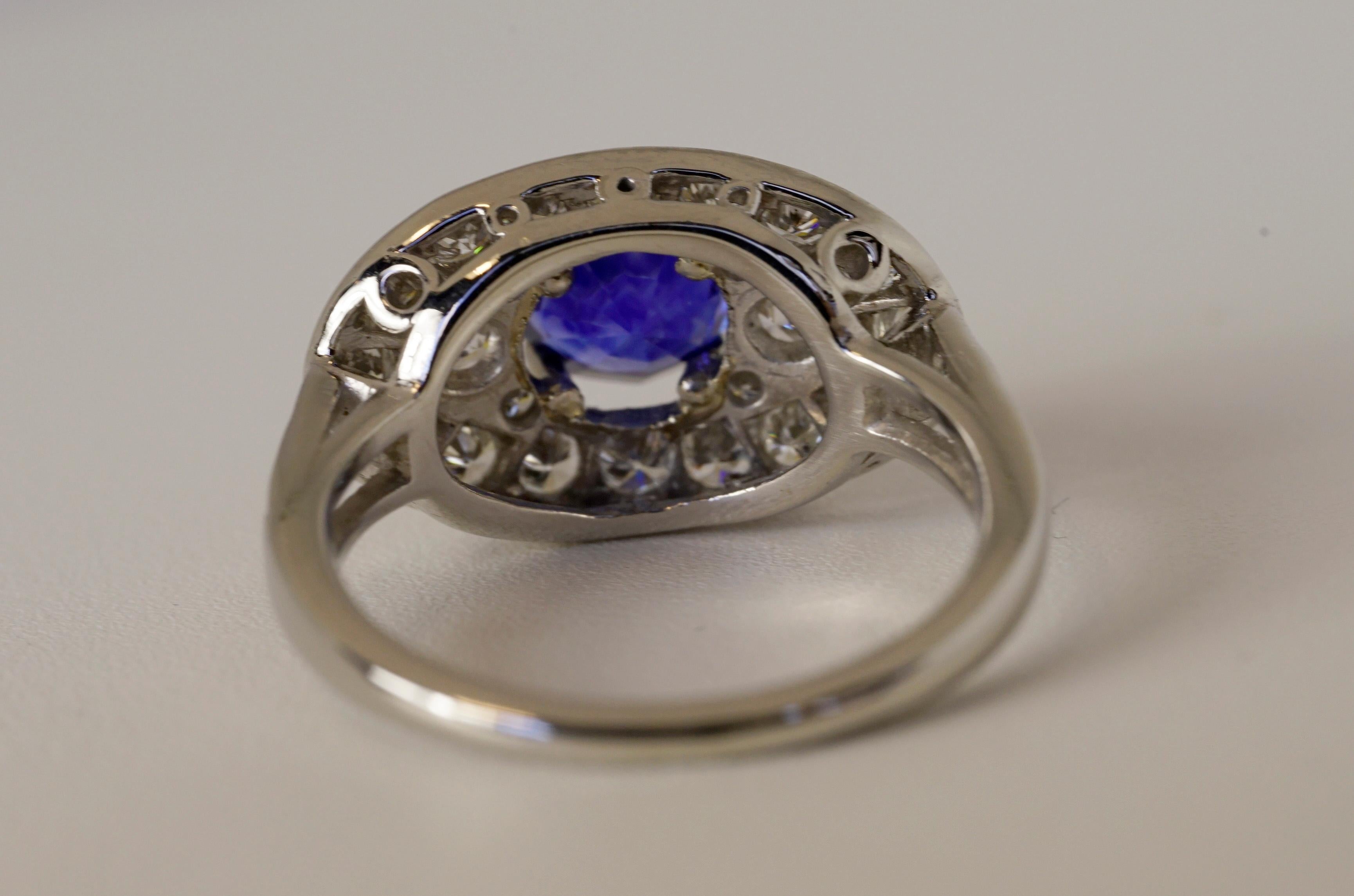 Round Shape Natural Ceylon Sapphire weight 1.57 carats, set in a Platinum ring with pave round brilliant cut diamonds (F VS) weighing 1.00 carat total.
2.57 carats total weight ,Size 7 .