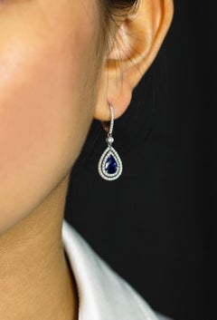 2.57 Carats Pear Shape Blue Sapphire with Diamond Double Halo Dangle Earrings