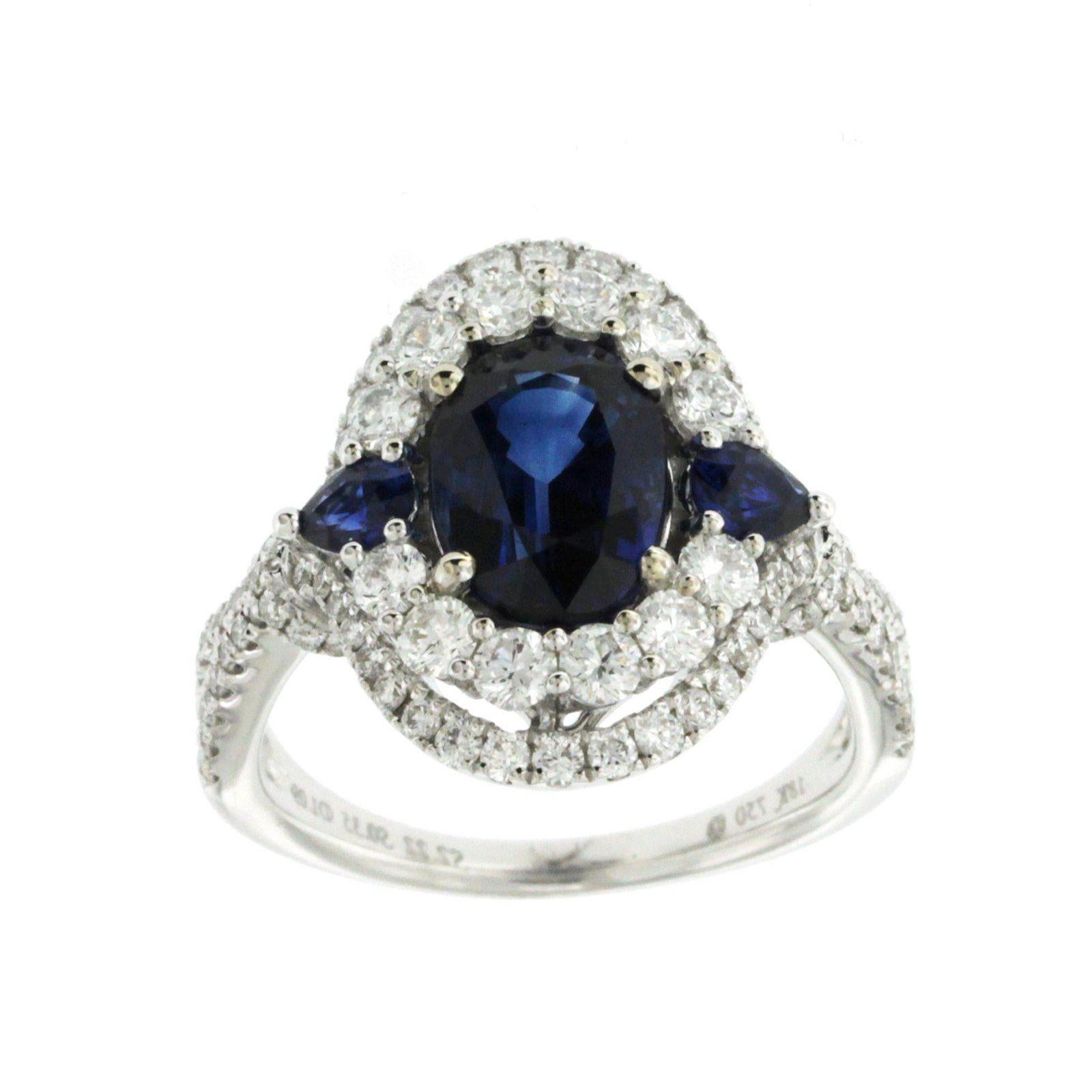 2.57 CT Ceylon Sapphires & 1.09 CT Diamonds in 18K White Gold Engagement Ring

Top: 17.5 mm
Band Width: 2 mm
Metal: 18K White Gold 
Size: 6-8 ( Please message Us for your Size )
Hallmarks: 750
Total Weight: 7.1 Grams
Stone Type: 2.57 CT Natural