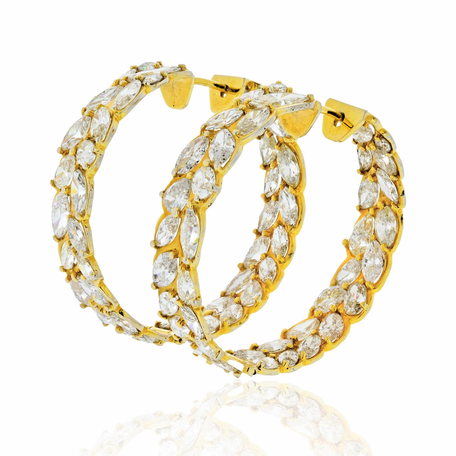 A bold new design, with a definitively luxury feel, our marquise-cut diamond Hoops feature eye-catching layout punctuated with mixed-cut diamonds inside and out. 
25 Carat inside and out diamond hoop earrings. 
Marquise-Cut Diamonds: 60