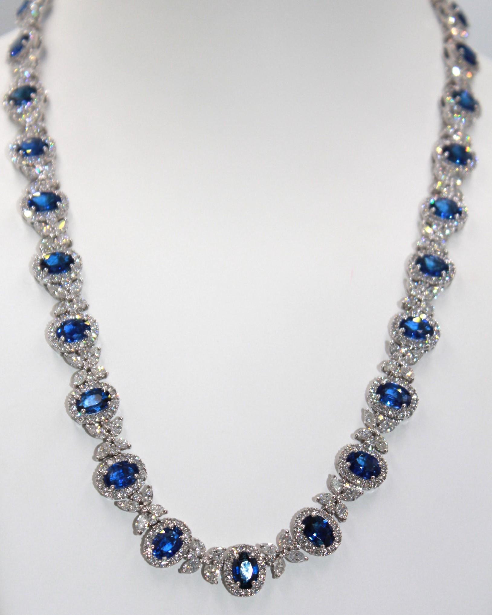 25.73 carats oval shaped Ceylon Sapphire with 112 marquise shaped and 448 round diamonds, totaling a diamond weight of 16.59 carats. 

This stunning Sapphire & Diamond Necklace will highlight your uniqueness and elegance. 

Item Details:
- Type: