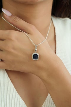 2.57ct Blue Sapphire & Diamond Halo Pendant with Hinged Locking Bail in 14K Gold