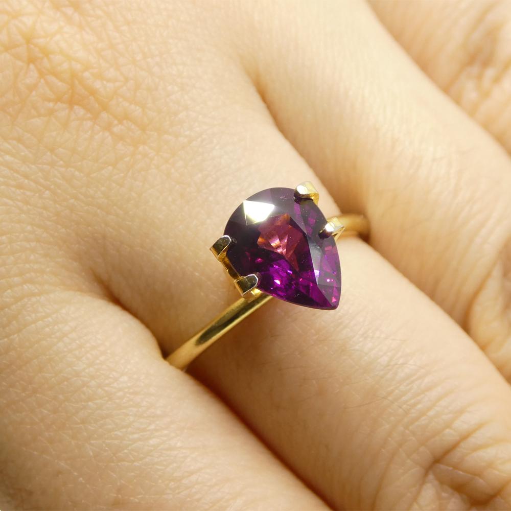 Description:

Gem Type: Rhodolite Garnet
Number of Stones: 1
Weight: 2.57 cts
Measurements: 9.68 x 7.28 x 4.88 mm
Shape: Pear Shape
Cutting Style Crown: Brilliant Cut
Cutting Style Pavilion: Step Cut
Transparency: Transparent
Clarity: Very Slightly