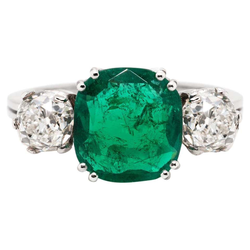 Colombian Emerald Platinum Three-Stone Engagement Ring at 1stDibs