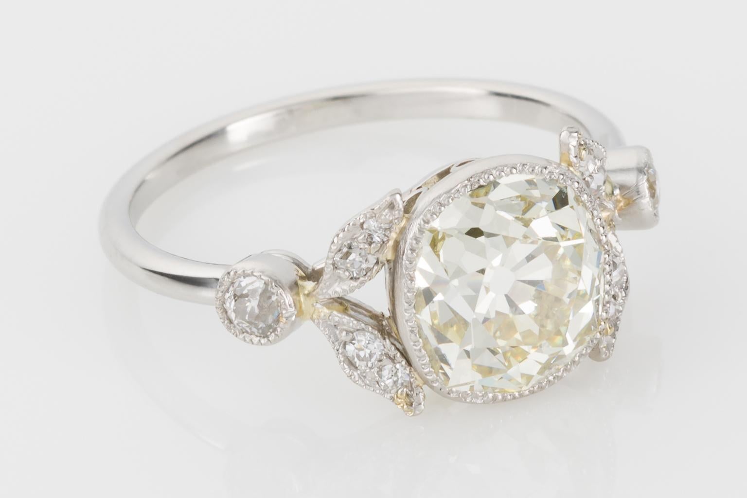 This ring is just perfection, it fits the criteria for every womans dream engagement ring.  From the central old cushion cut diamond which weighs approximately 2.40cts to the elegant leaf details & the delicate platinum mounting, I can't see any