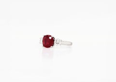 2.58 Carat Cushion Cut Ruby and Diamond Three-Stone Engagement Ring