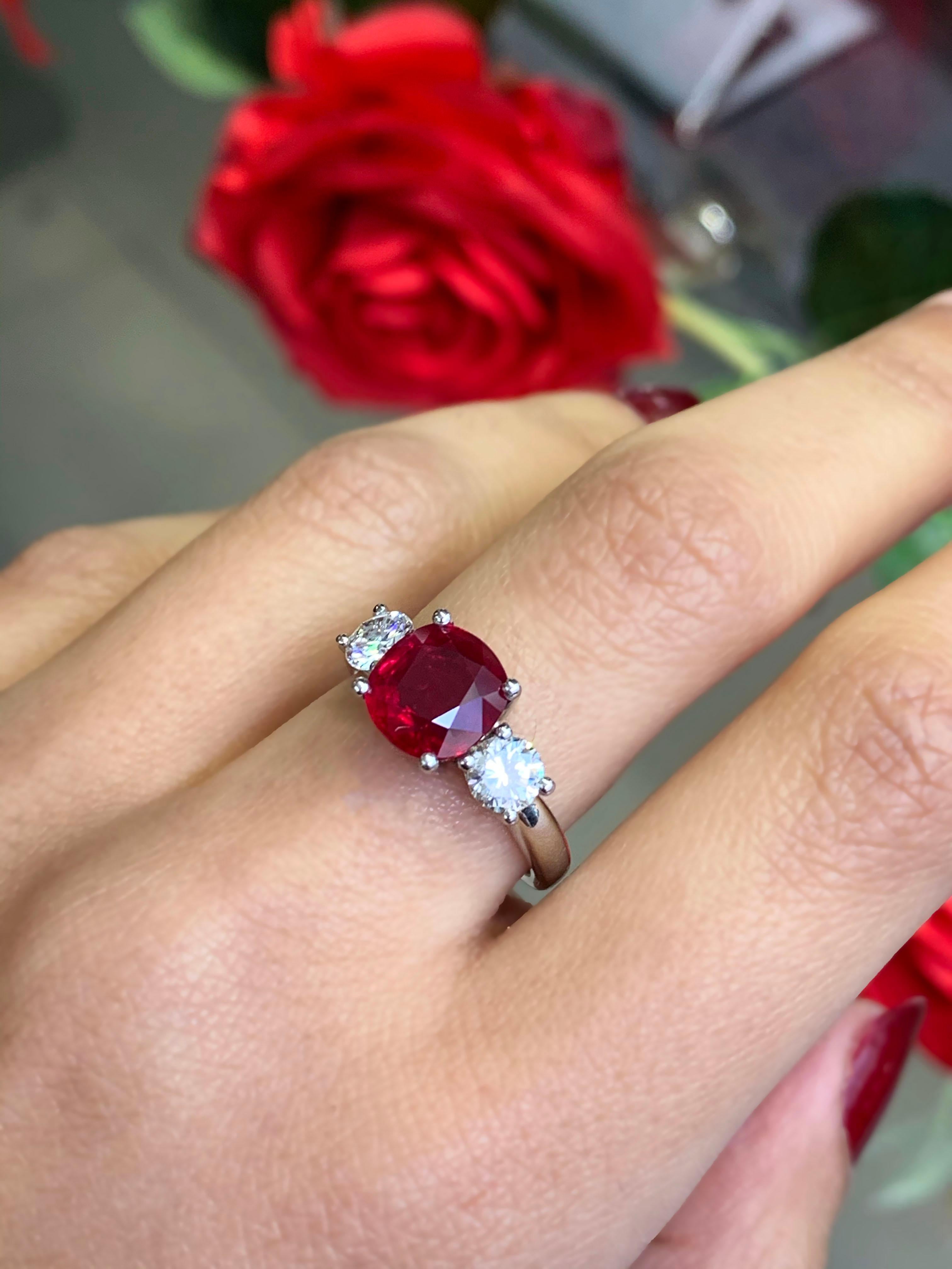 Women's 2.58 Carat Cushion Cut Ruby and Diamond Three-Stone Engagement Ring For Sale