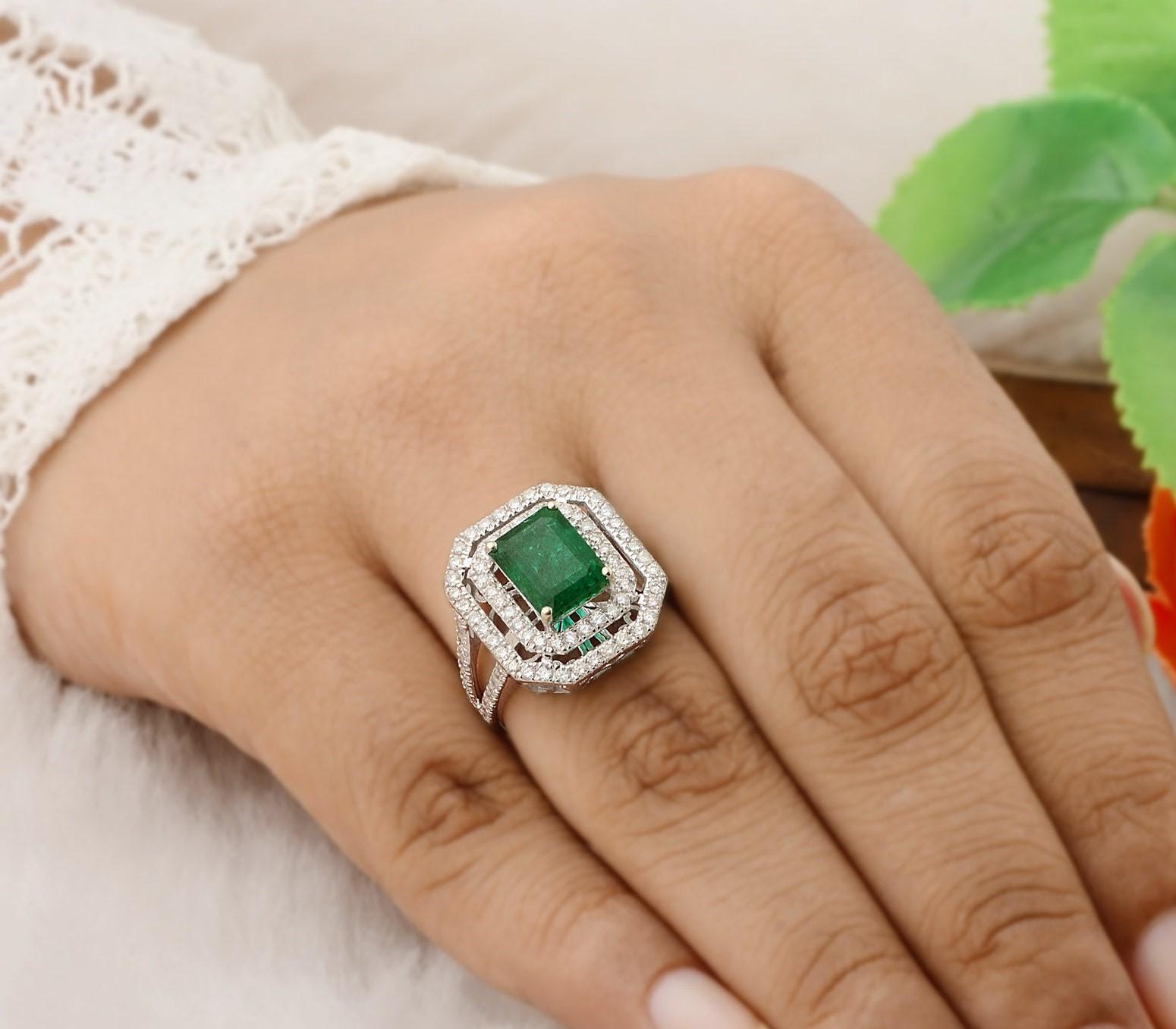 This ring has been meticulously crafted from 10-karat gold.  It is hand set with 2.58 carats emerald & 1.12 carats of sparkling diamonds. 

The ring is a size 7 and may be resized to larger or smaller upon request. 
FOLLOW  MEGHNA JEWELS storefront