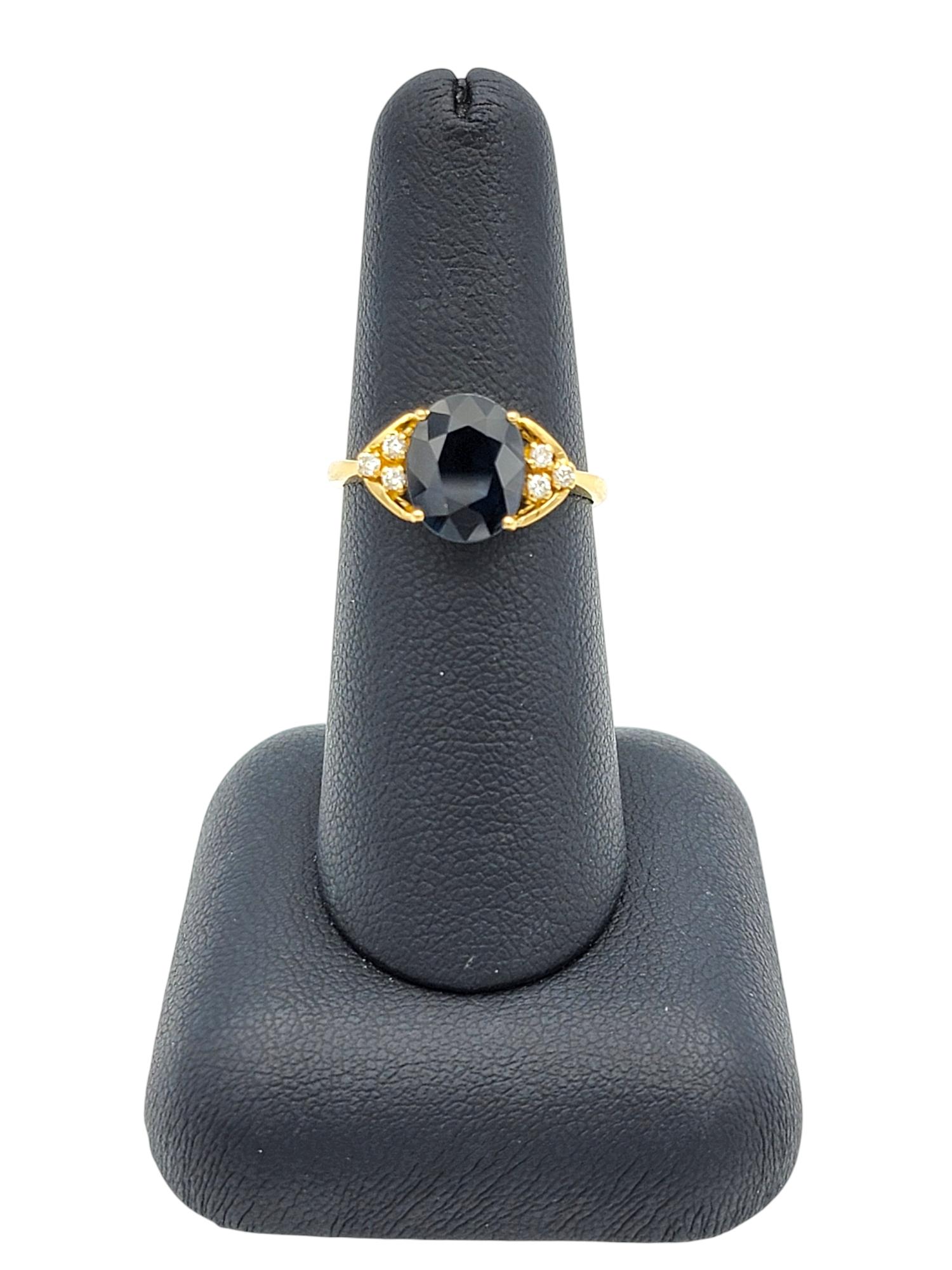 2.58 Carat Oval Cut Blue Sapphire Ring with Diamonds in 18 Karat Yellow Gold For Sale 5