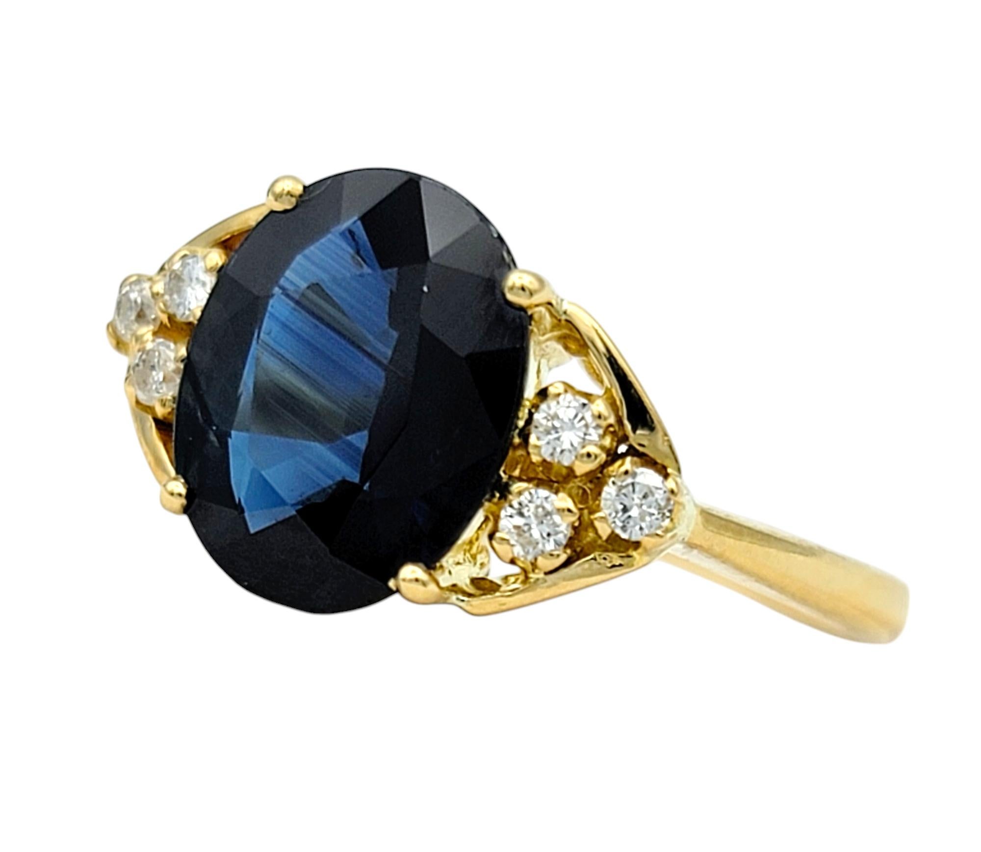 Ring Size: 7.25

A breathtaking combination of elegance and sophistication, this sapphire and diamond ring exudes timeless beauty. At its heart lies a stunning oval-cut blue sapphire, radiating deep, rich hues reminiscent of a serene twilight sky.