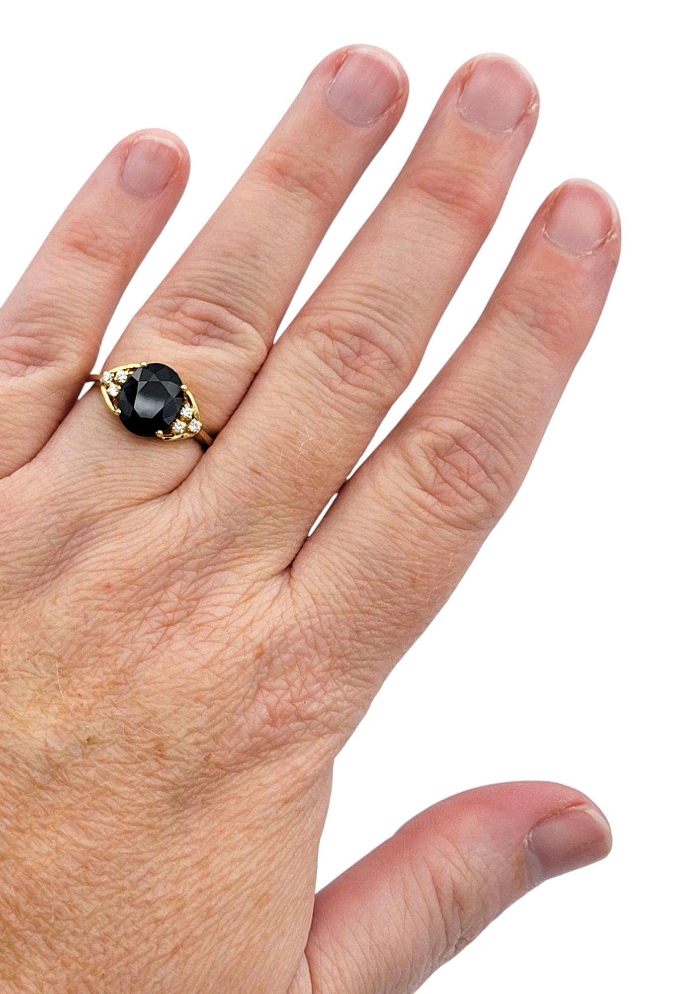 2.58 Carat Oval Cut Blue Sapphire Ring with Diamonds in 18 Karat Yellow Gold For Sale 3