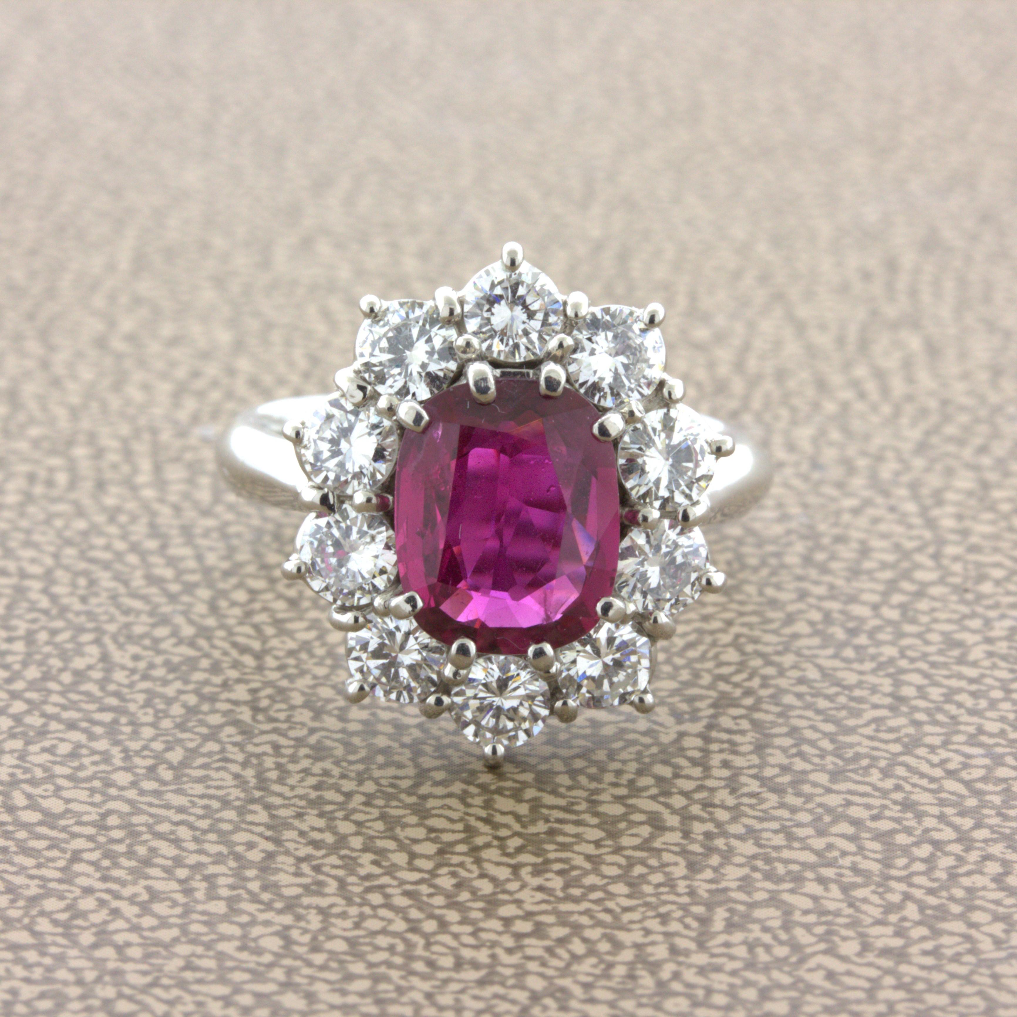 A lovely ruby ring designed in the same manner as Princess Diana’s famous sapphire engagement ring. This piece features a very fine 2.58 carat ruby which has been certified by the GIA as natural with a Thai origin. Adding to that, the ruby has a