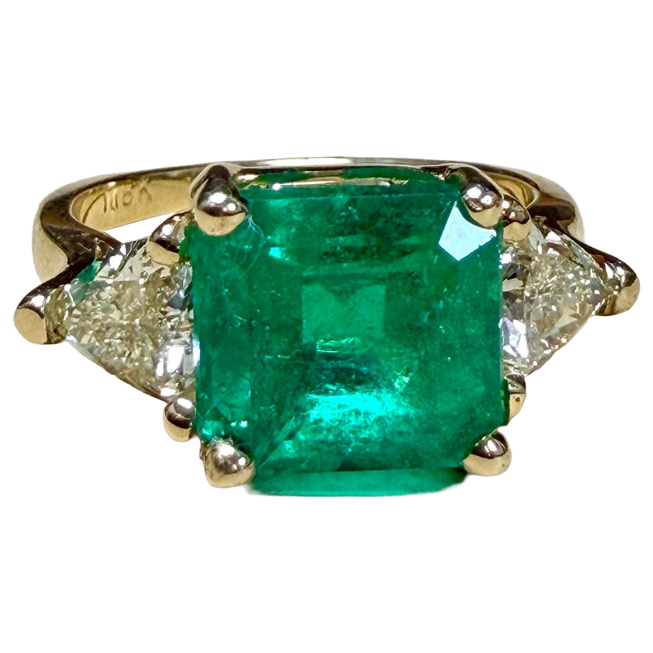 2.58 Ct Emerald Cut Colombian Emerald & 0.82 Ct Diamond Ring in 18K Yellow Gold
